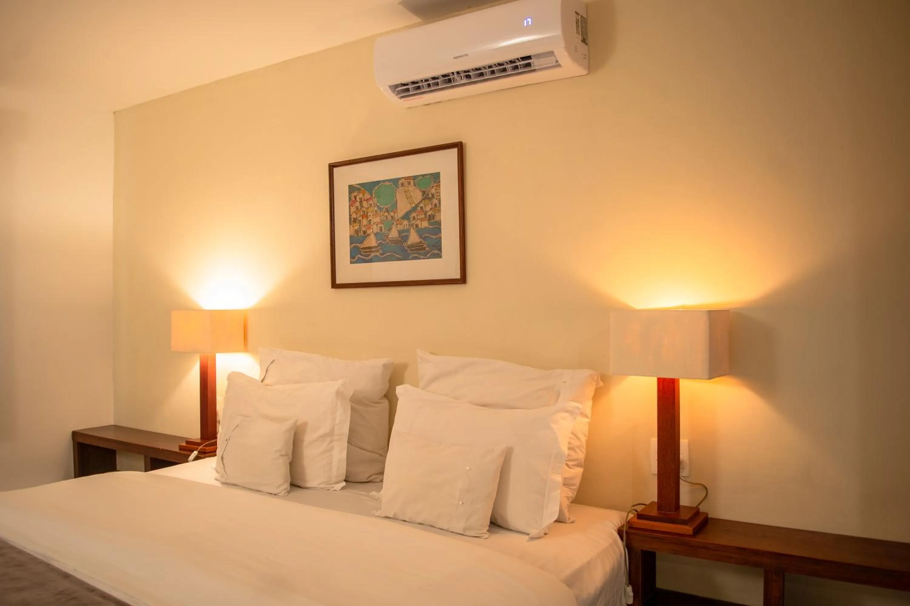 Bed in Pousada da Cyssa