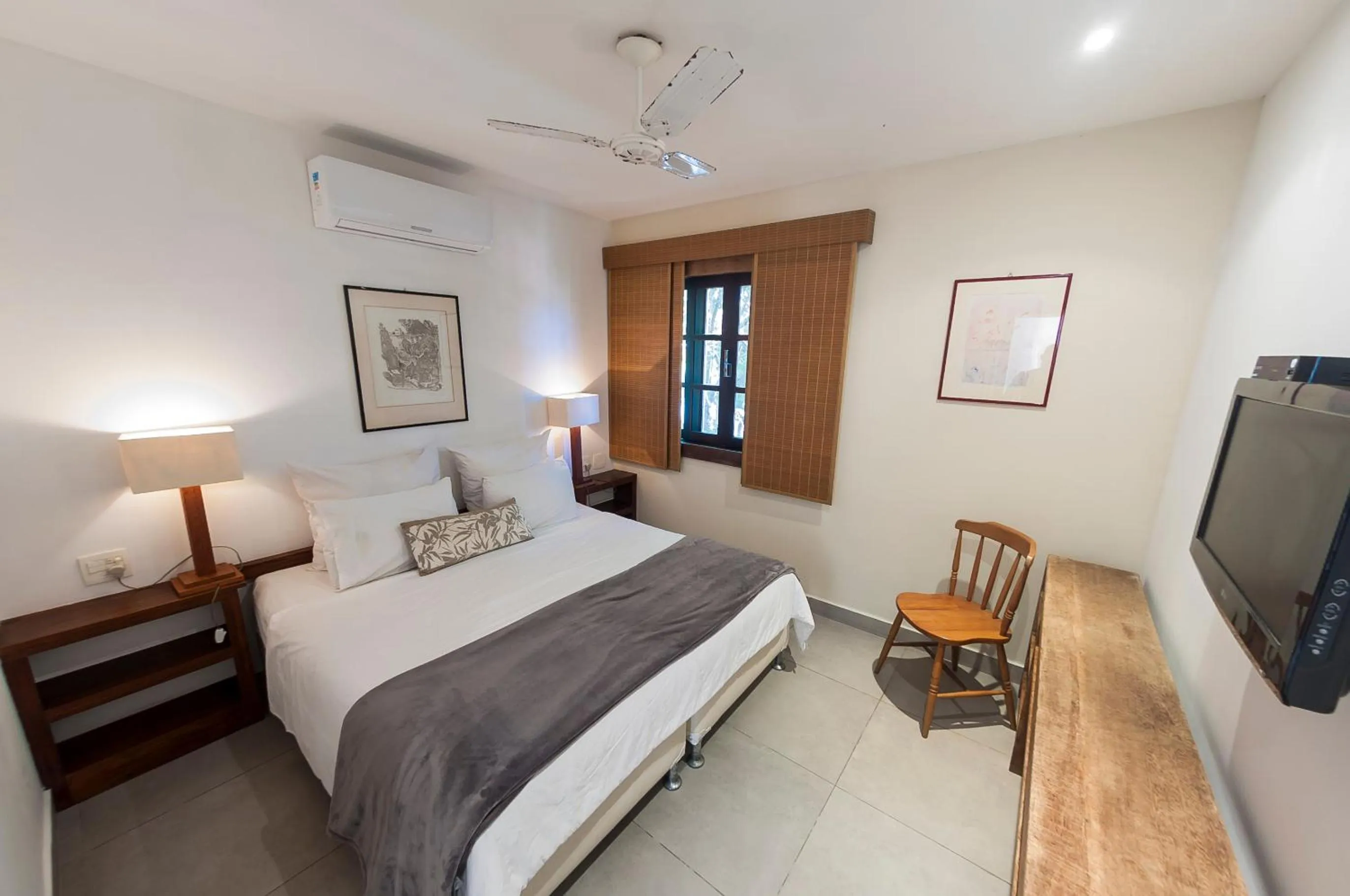 Bed in Pousada da Cyssa