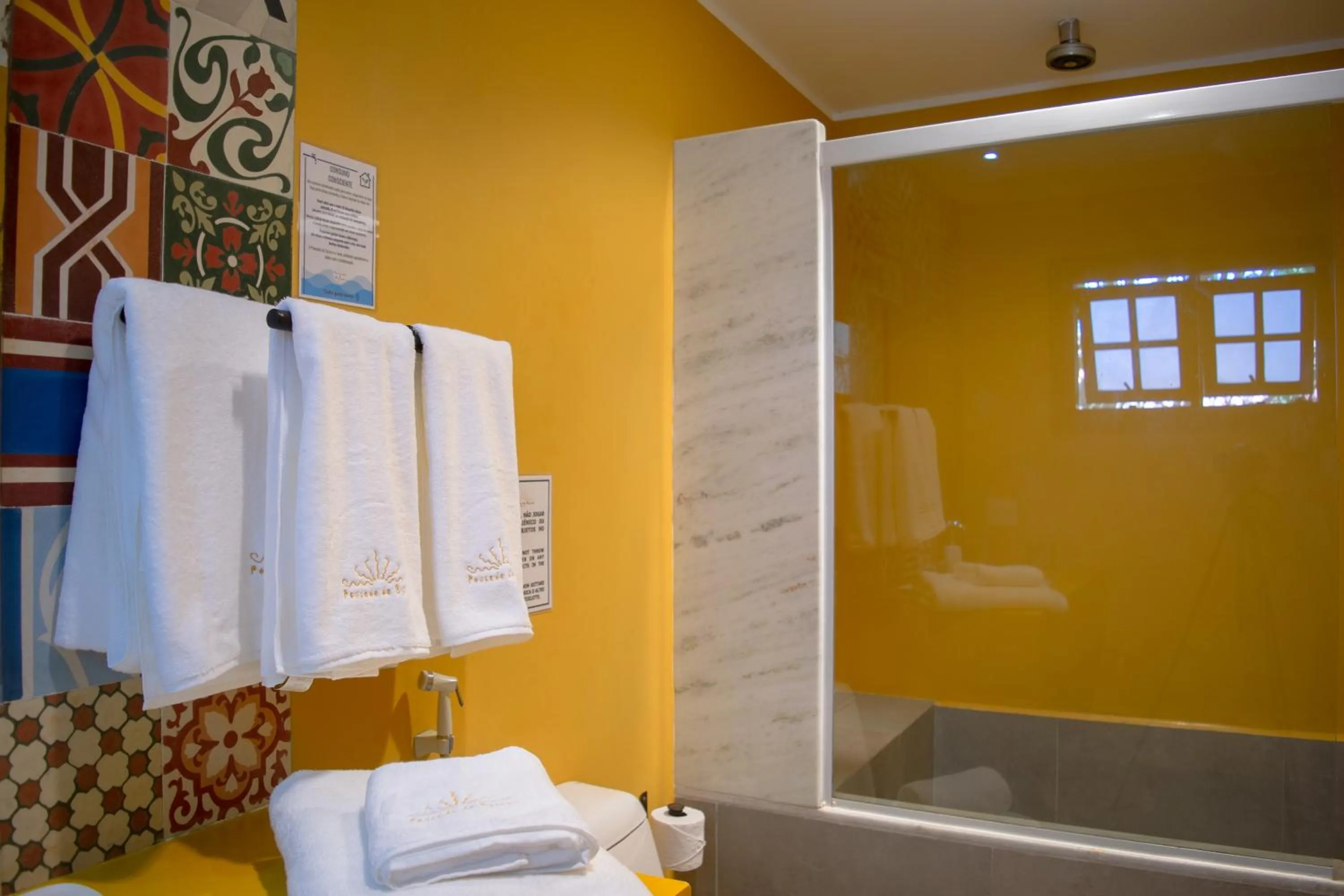 Bathroom in Pousada da Cyssa