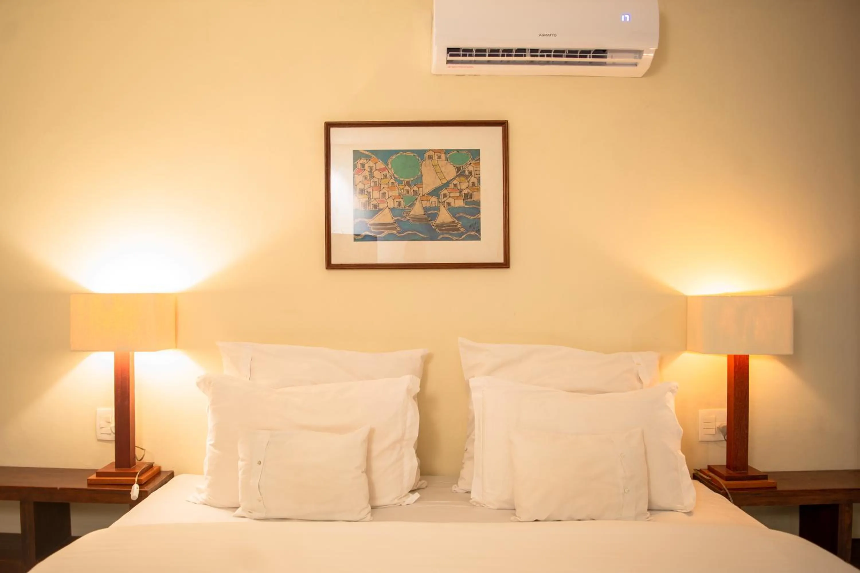 Bed in Pousada da Cyssa