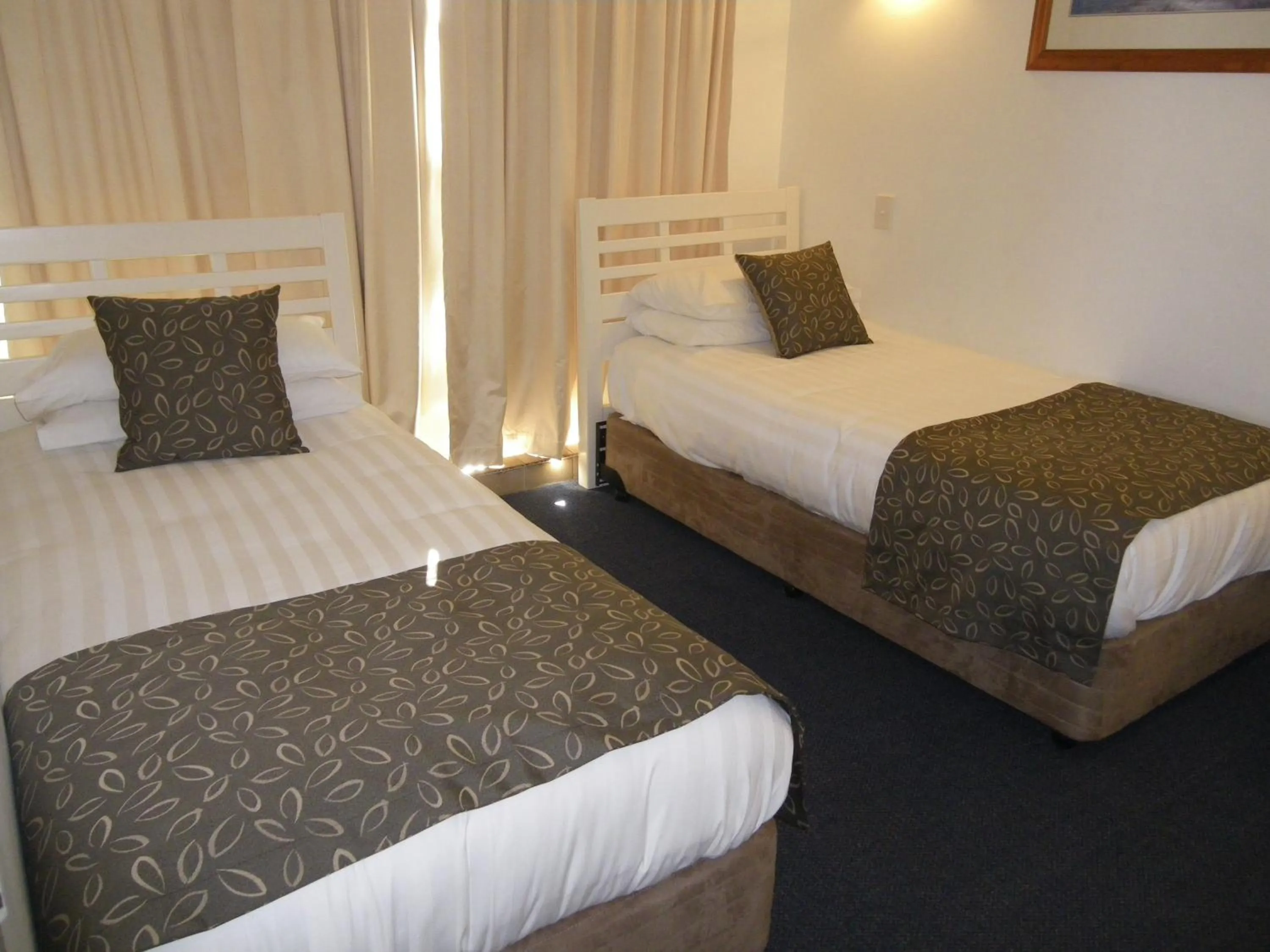 Photo of the whole room, Bed in Pacific Surf Absolute Beachfront Apartments