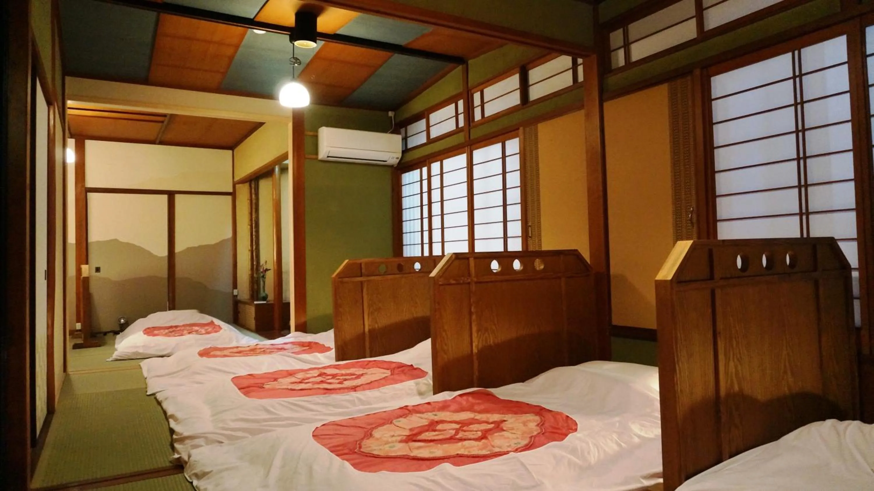 Bed in Japanese Guesthouse Kinosaki Wakayo (Female Only)