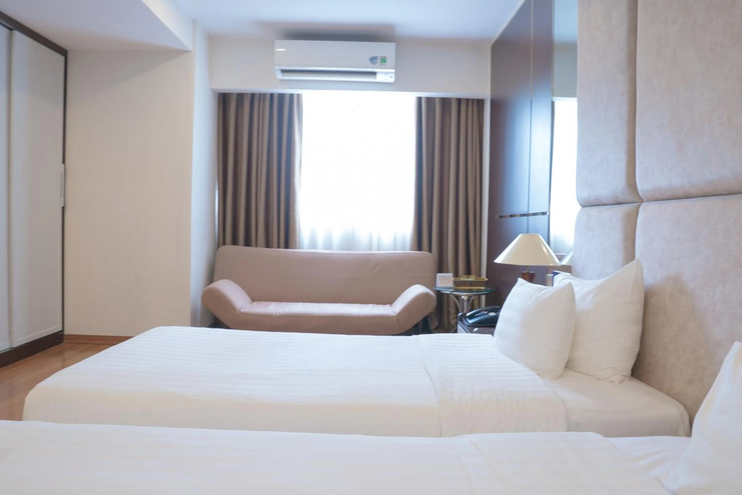 Bed in Bao Son International Hotel