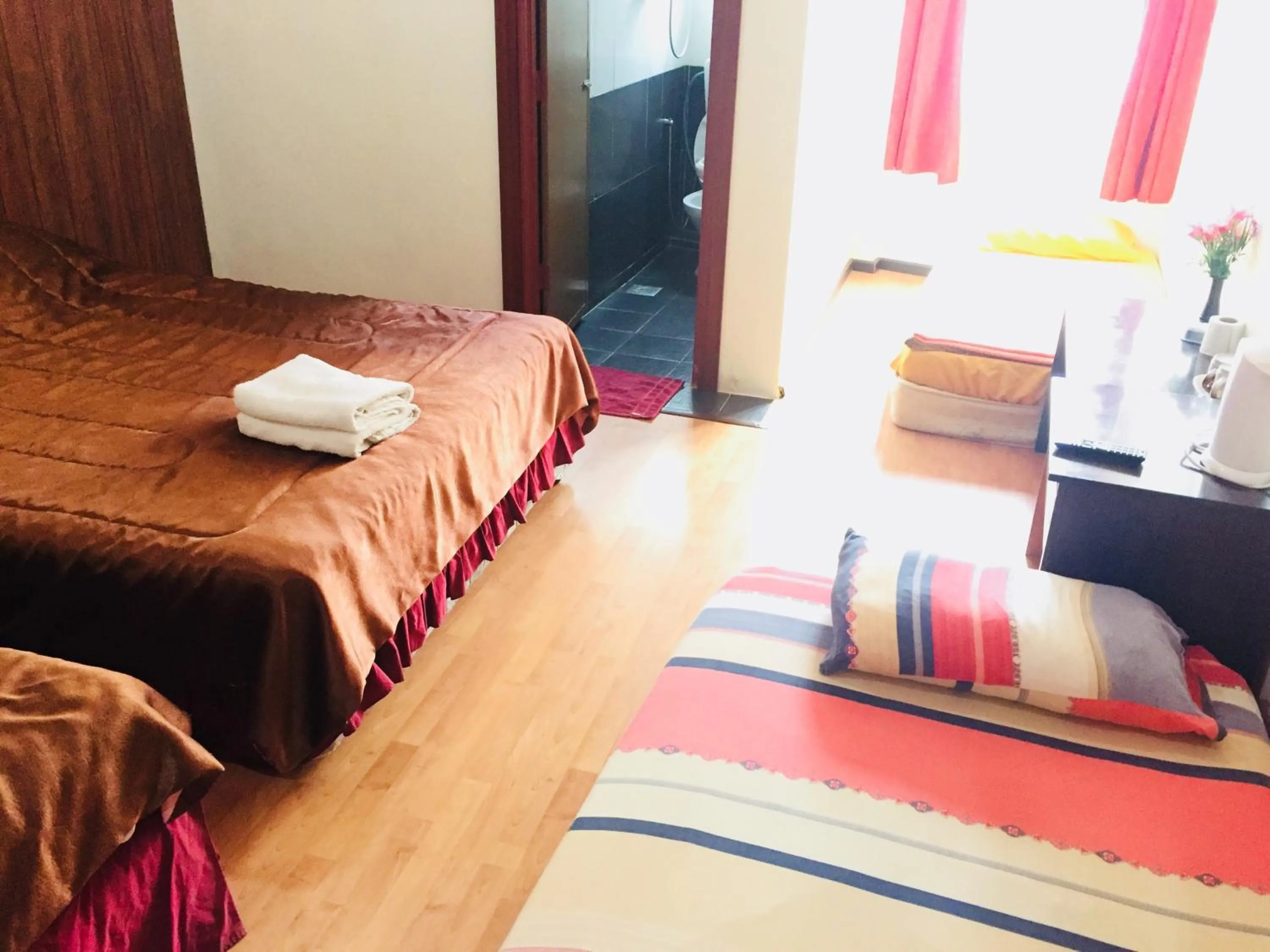 Bed in Golden Night Hotel Cameron Highlands