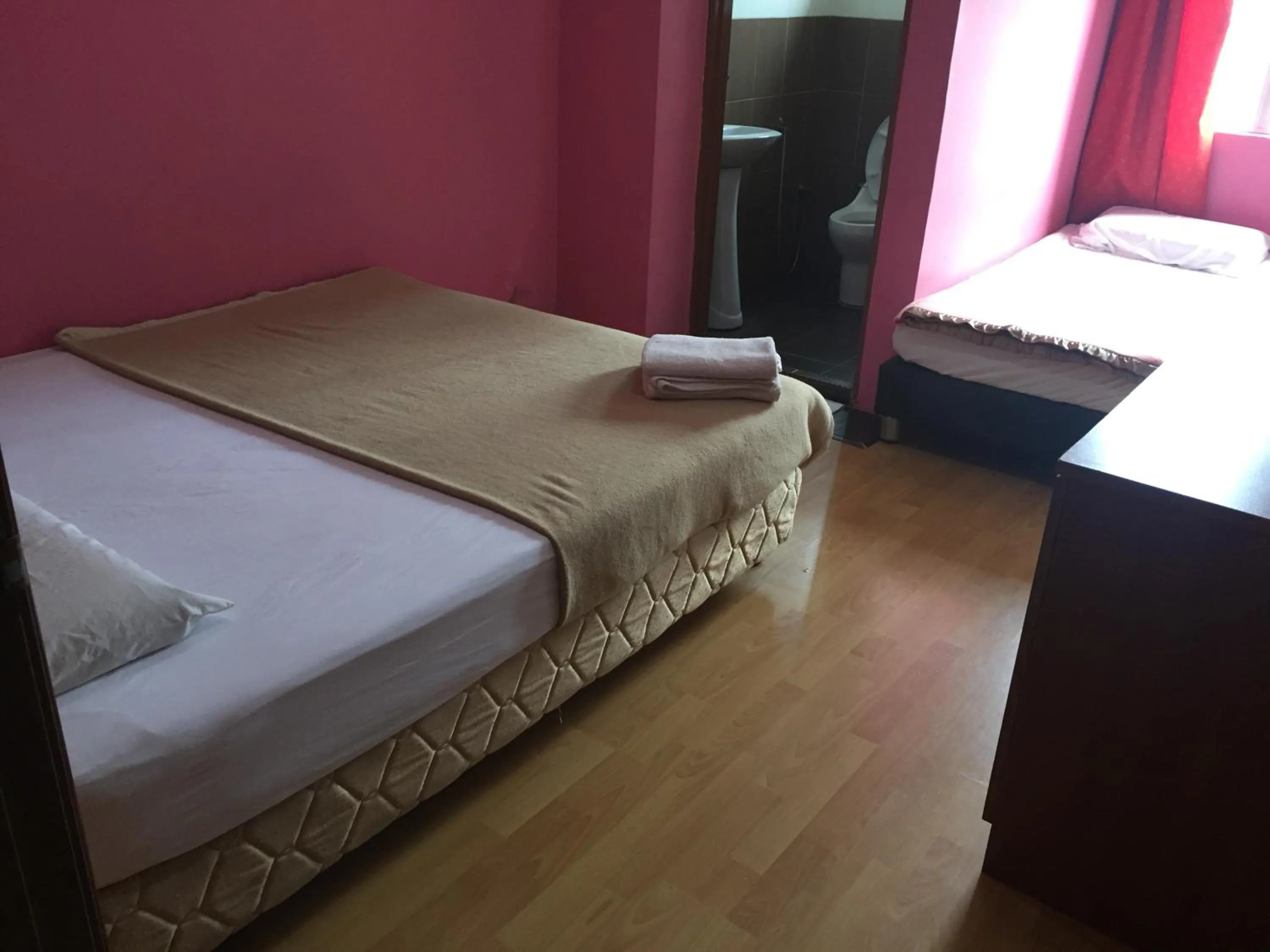 Bed in Golden Night Hotel Cameron Highlands