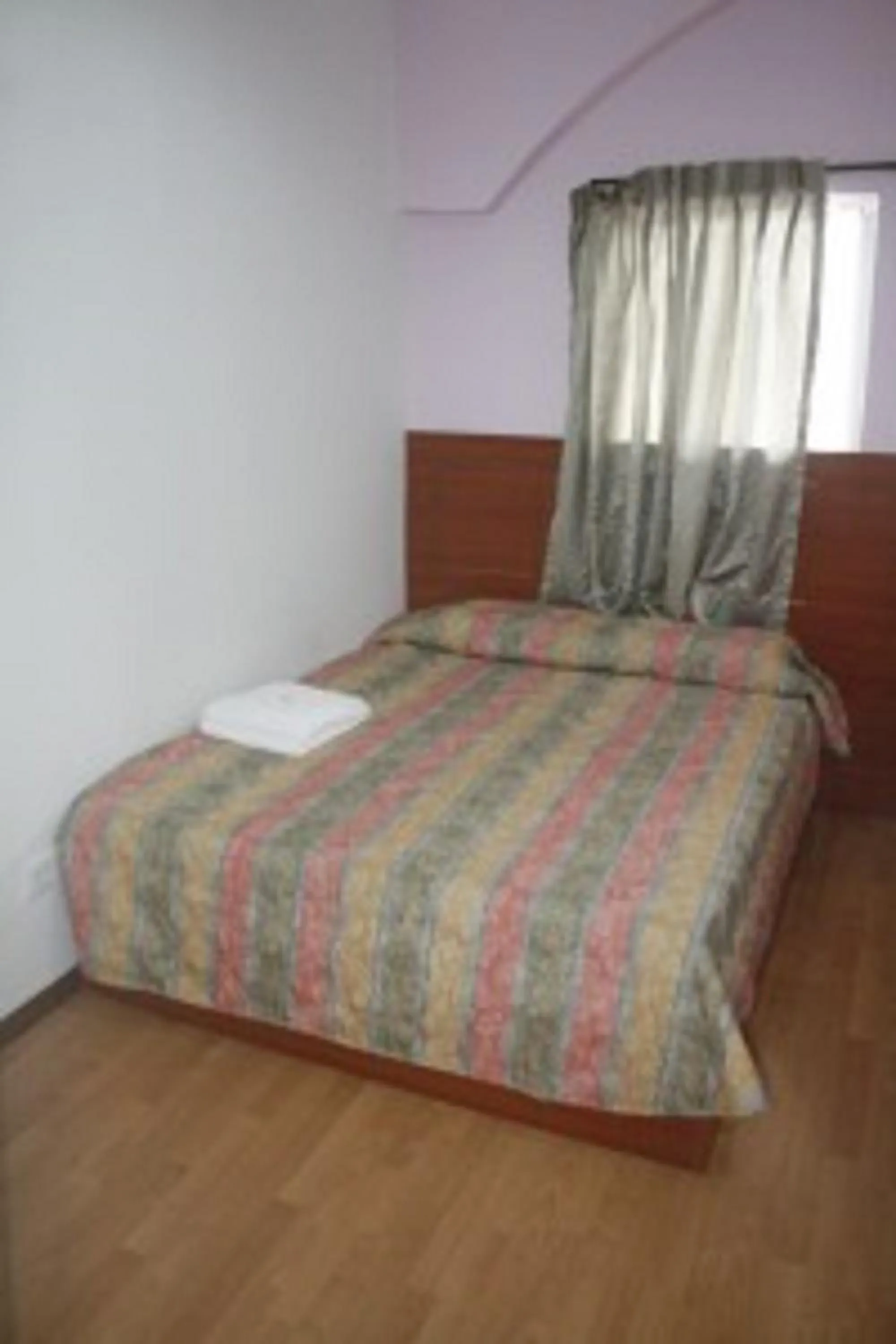 Bed in Golden Night Hotel Cameron Highlands