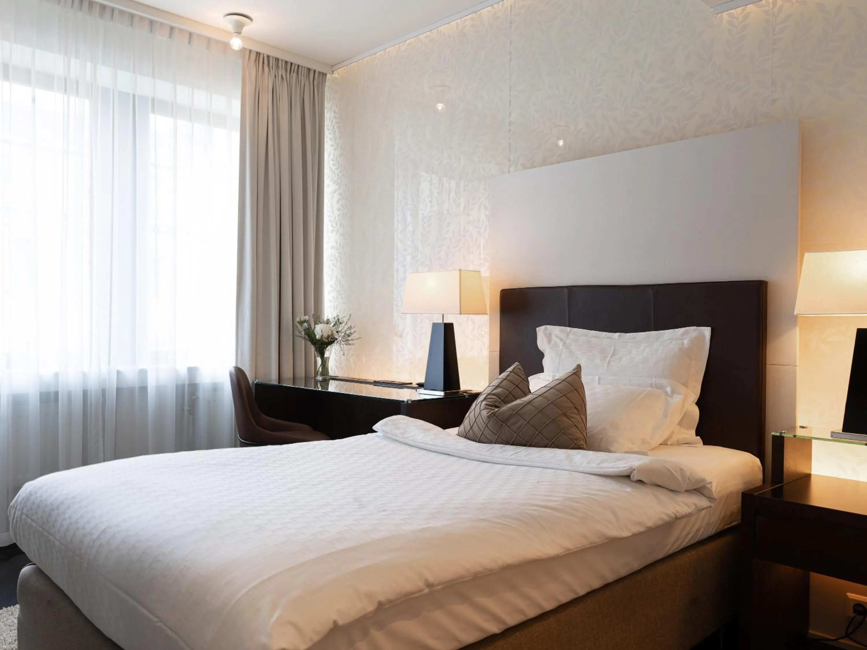 Bed in Elite Eden Park Hotel