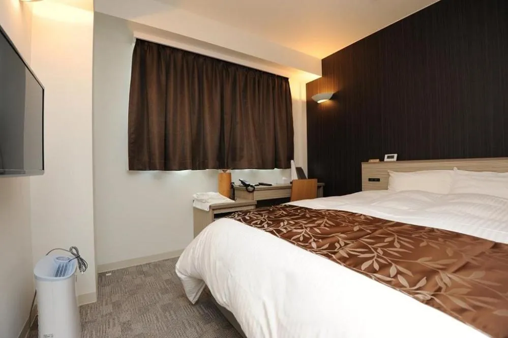 Bed in Hotel Sunriver Shimanto