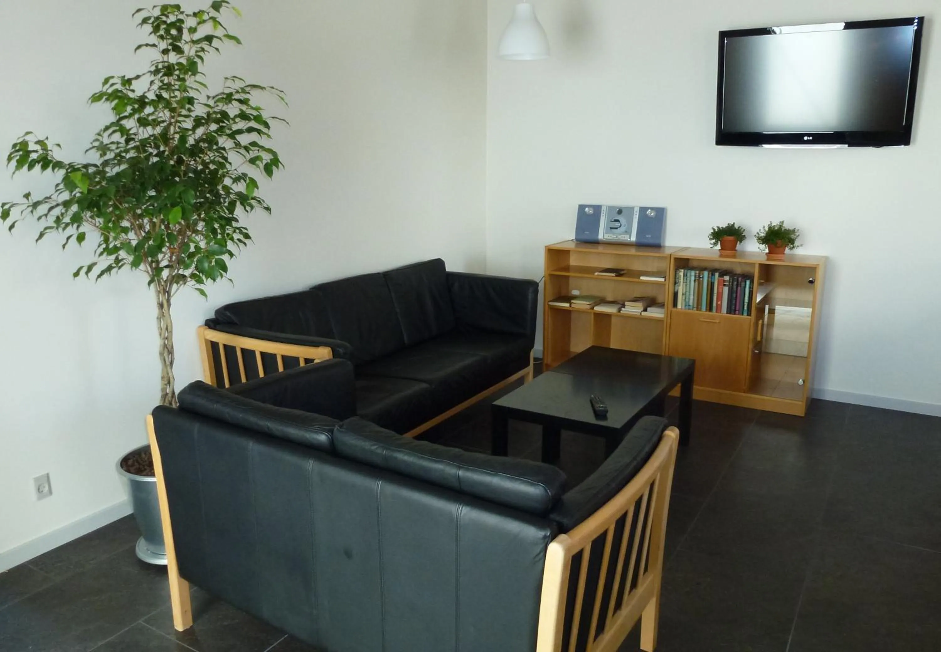 Communal lounge/ TV room in Danhostel Frederikshavn City