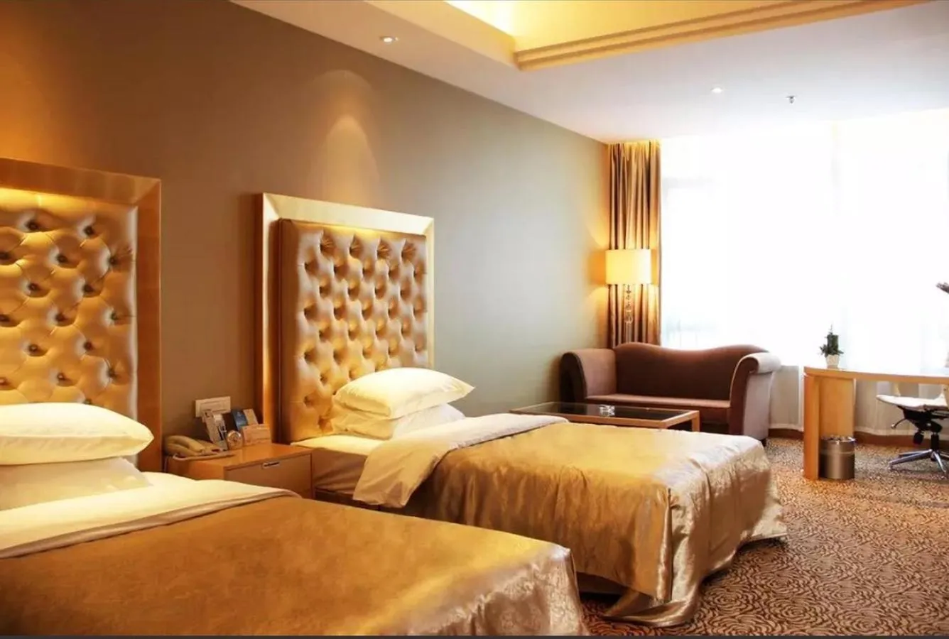 Bed in Glarun Jinling Hotel