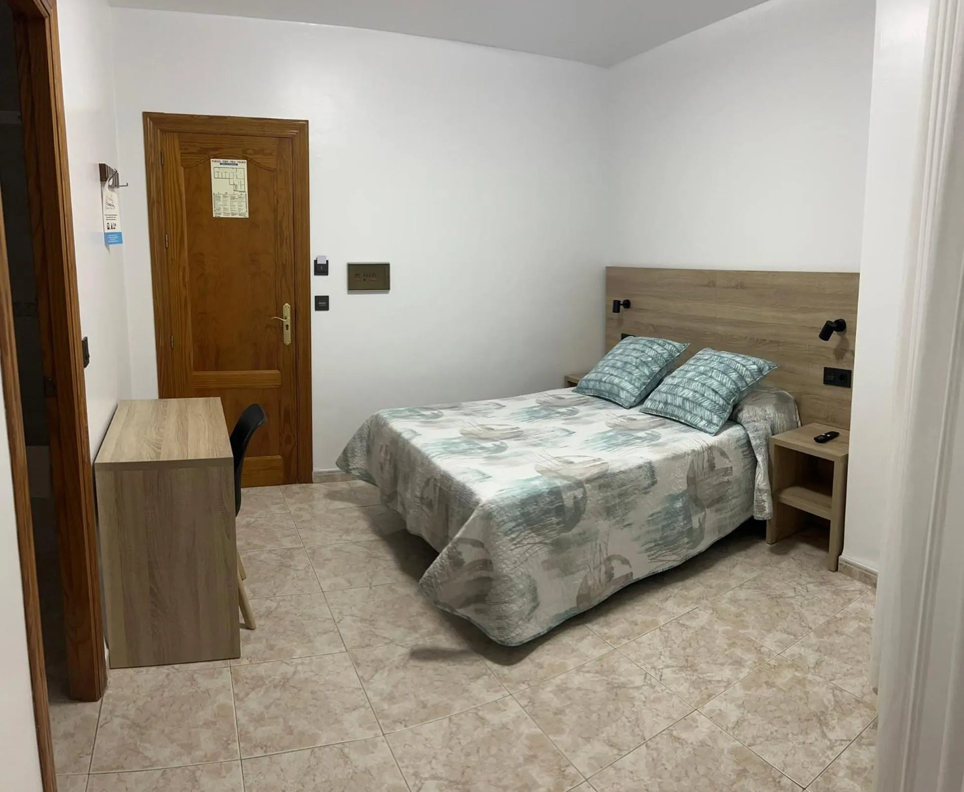 Bed in Hostal Juan Carlos