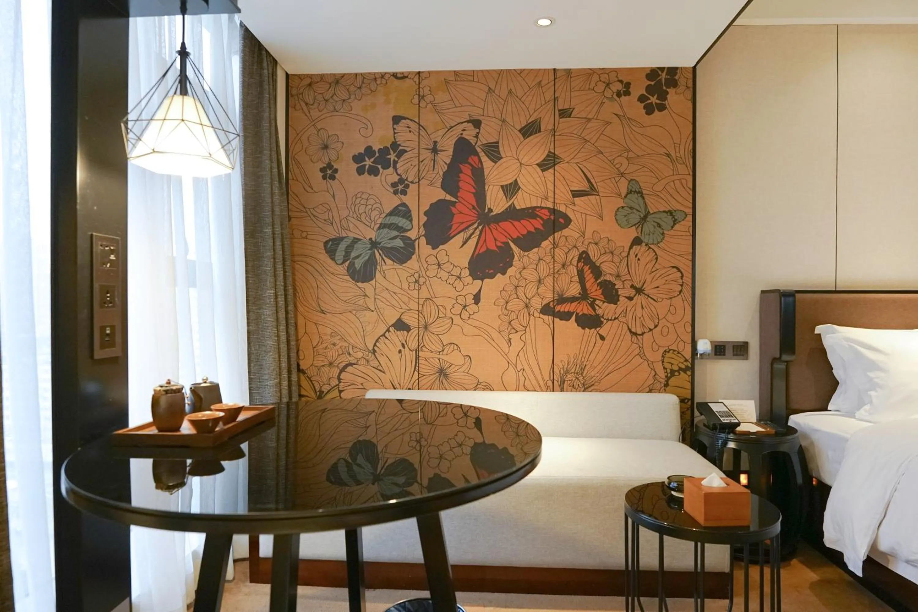 Living room, Bed in Paco Hotel GuangZhou Zoo Metro Branch