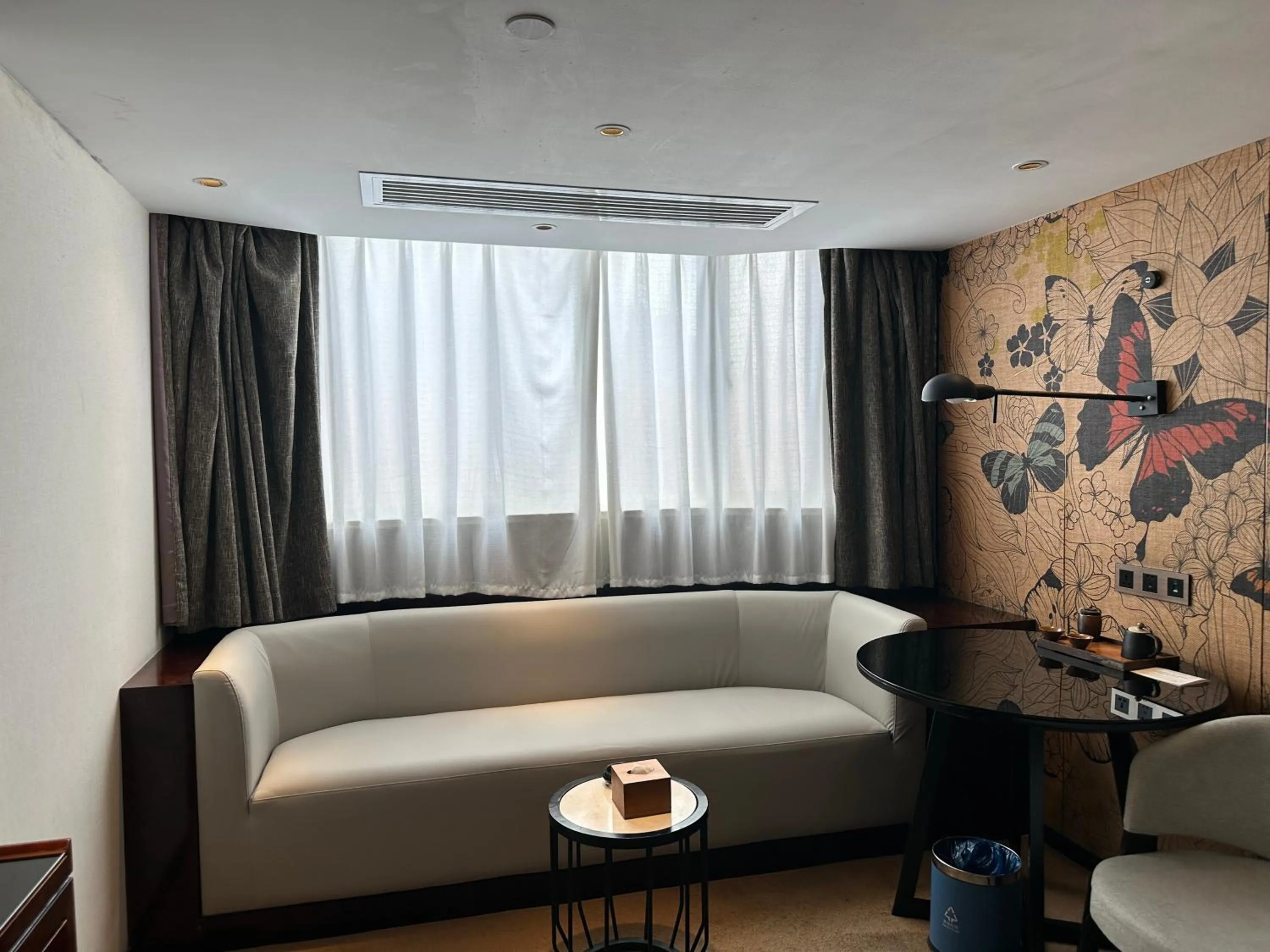 Seating area, Bed in Paco Hotel GuangZhou Zoo Metro Branch