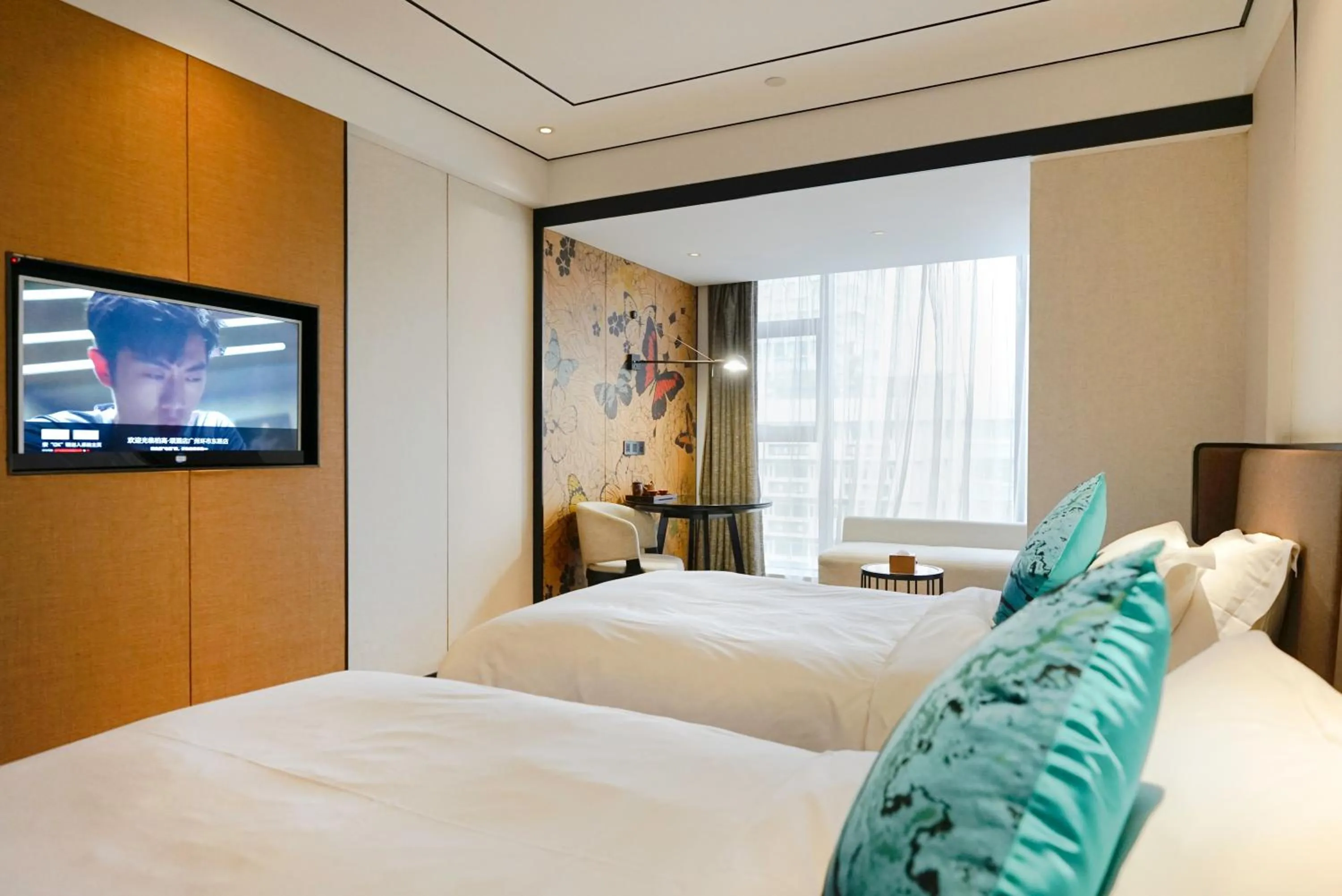 Bed in Paco Hotel GuangZhou Zoo Metro Branch