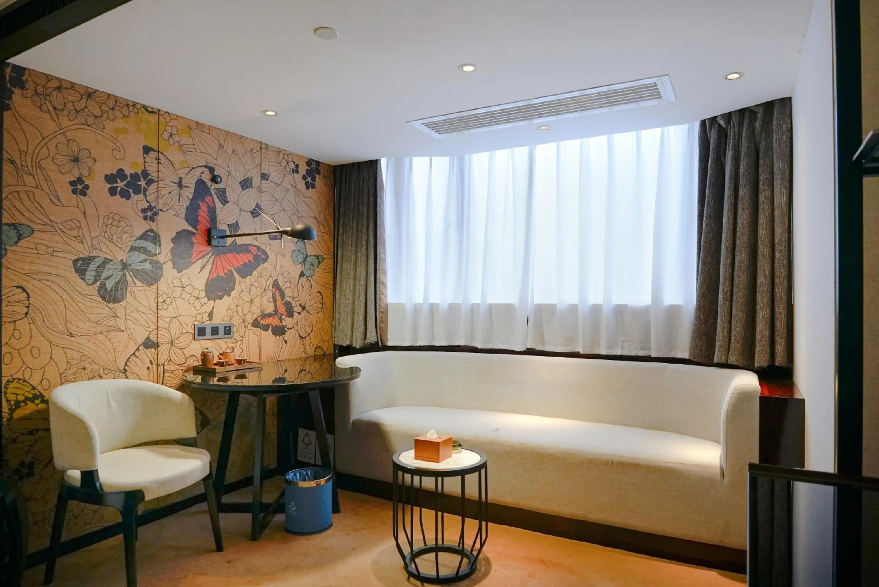 Living room in Paco Hotel GuangZhou Zoo Metro Branch