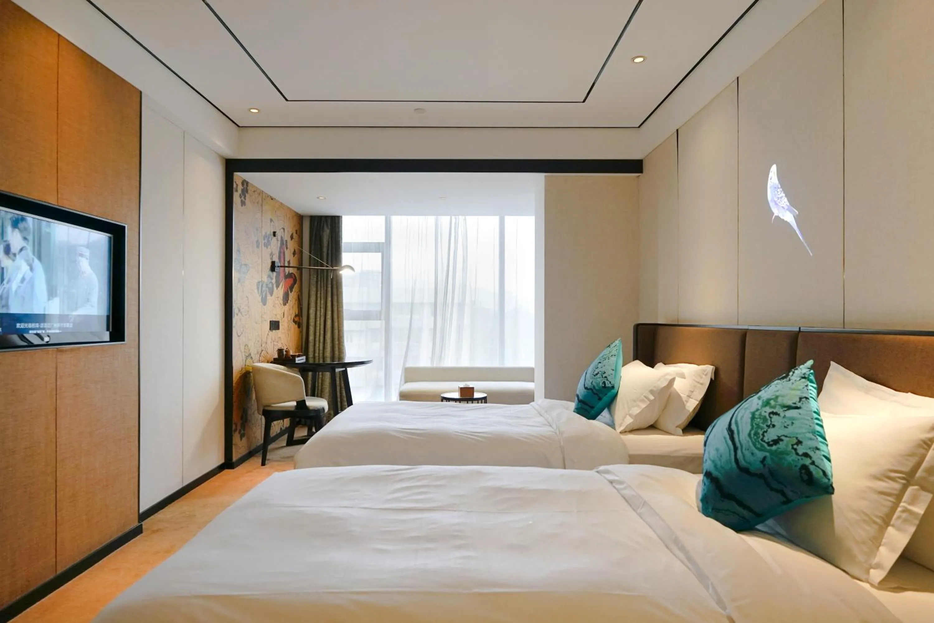 Bed in Paco Hotel GuangZhou Zoo Metro Branch