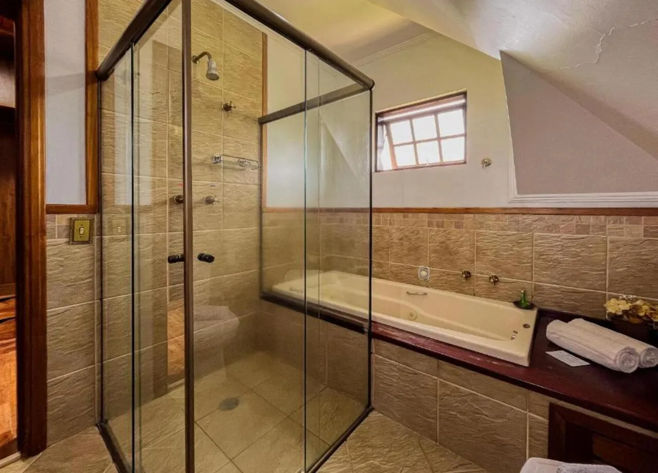 Bathroom in Pousada Victoria Villa By Nacional Inn - A 800 metros da Vila Capivari