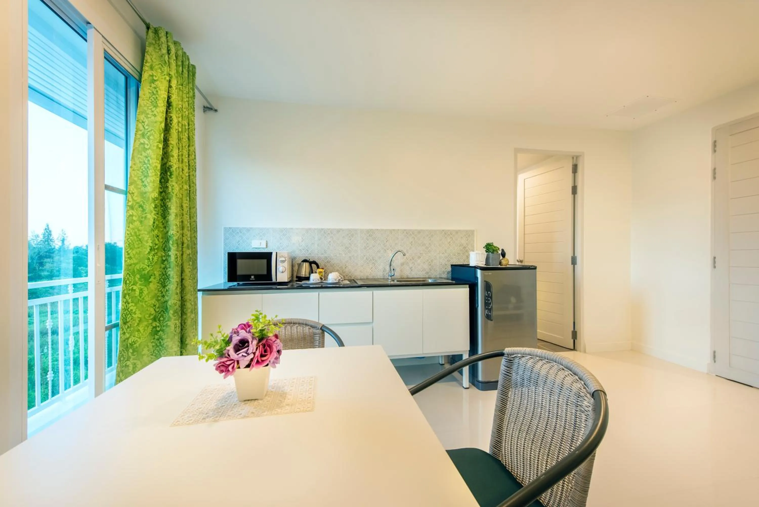 Kitchen or kitchenette, Bed in Chada@Nakhon