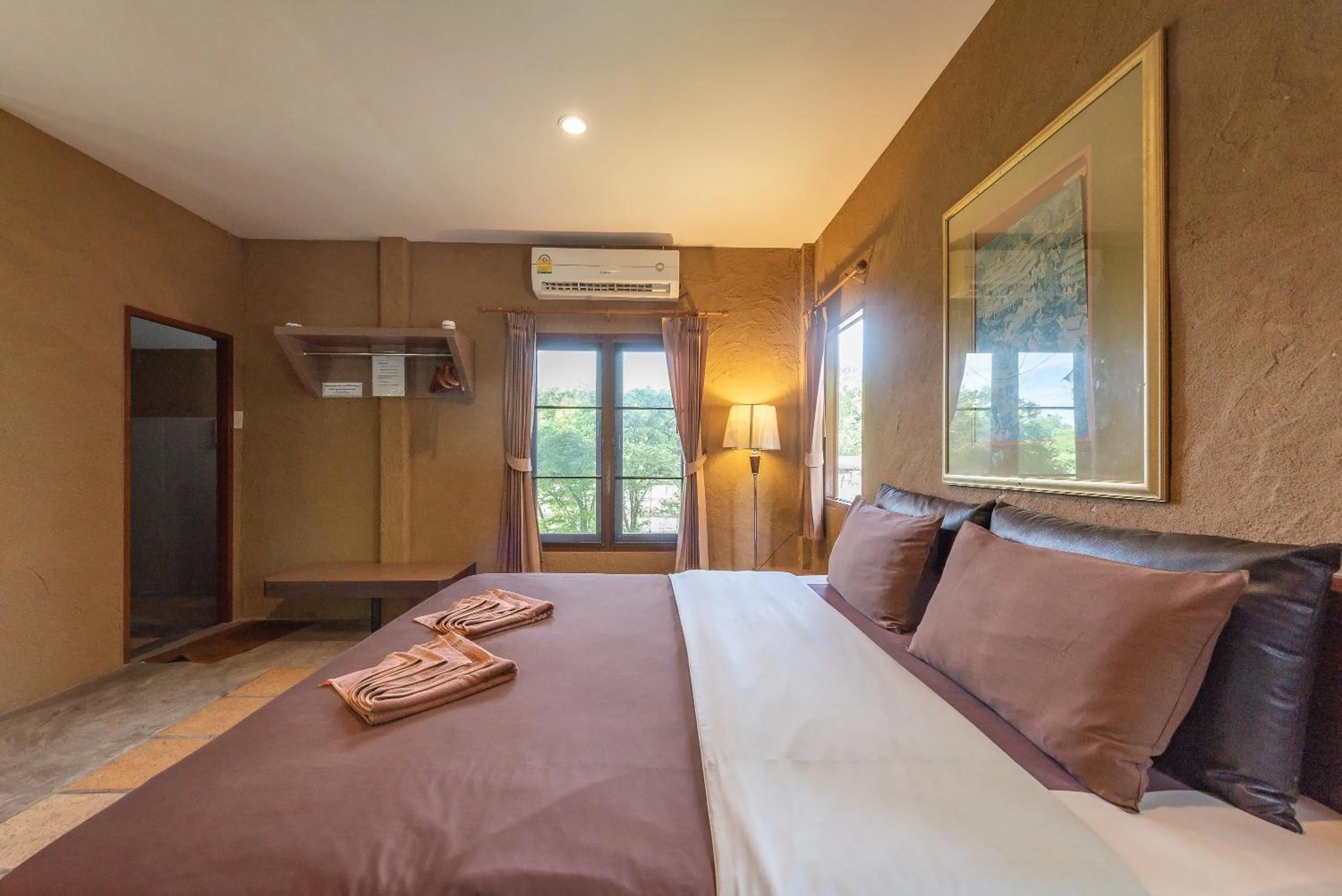 Bed in Muntra Garden Resort