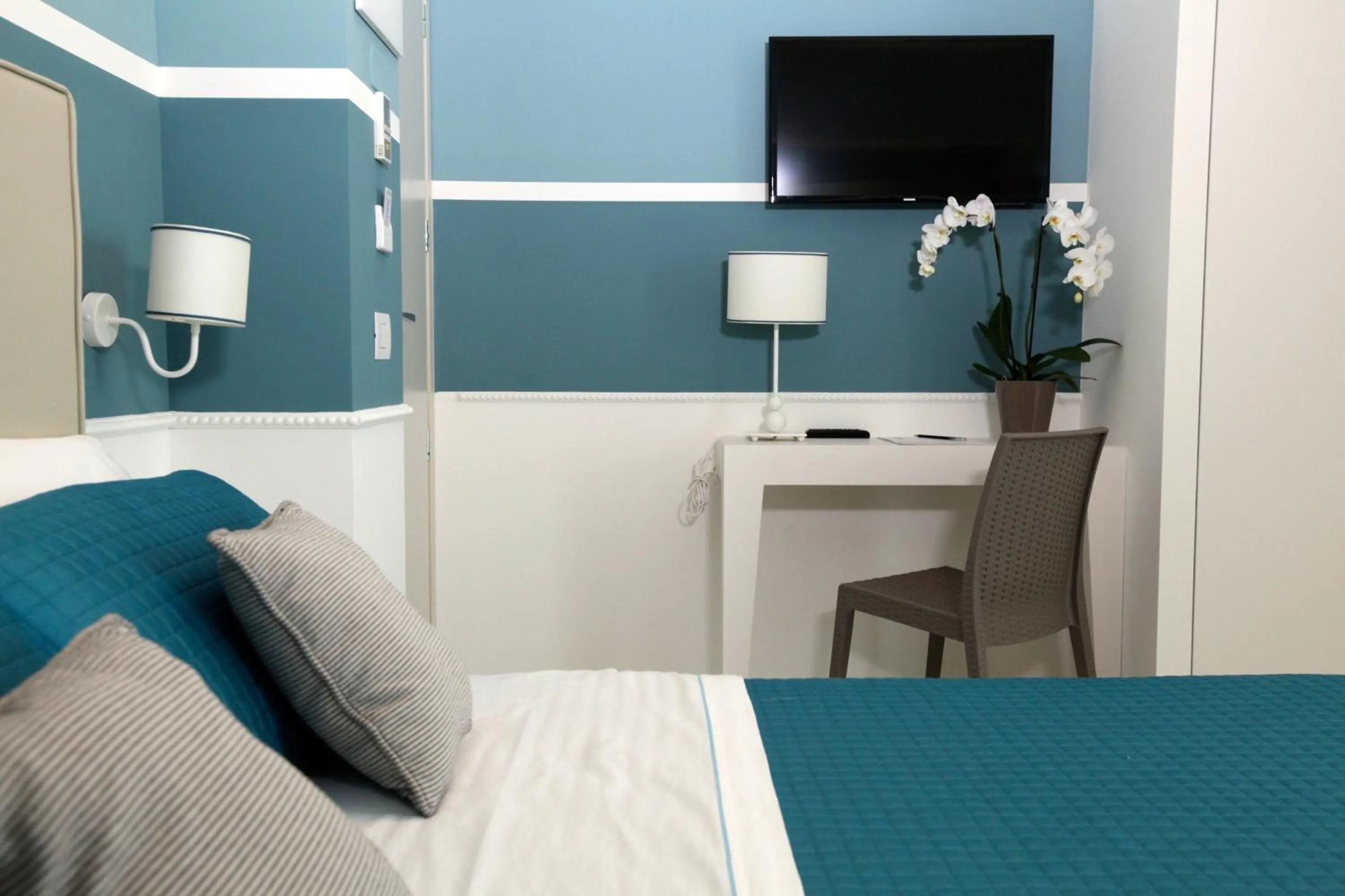 Bed in Hotel Ambassador