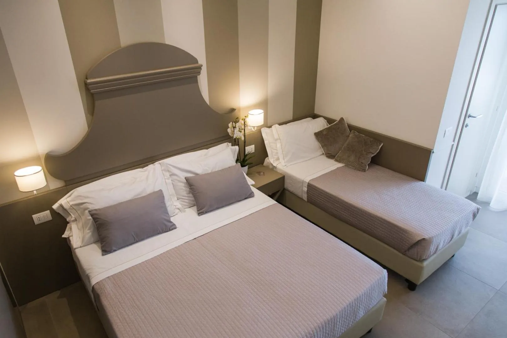 Bed in Hotel Ambassador