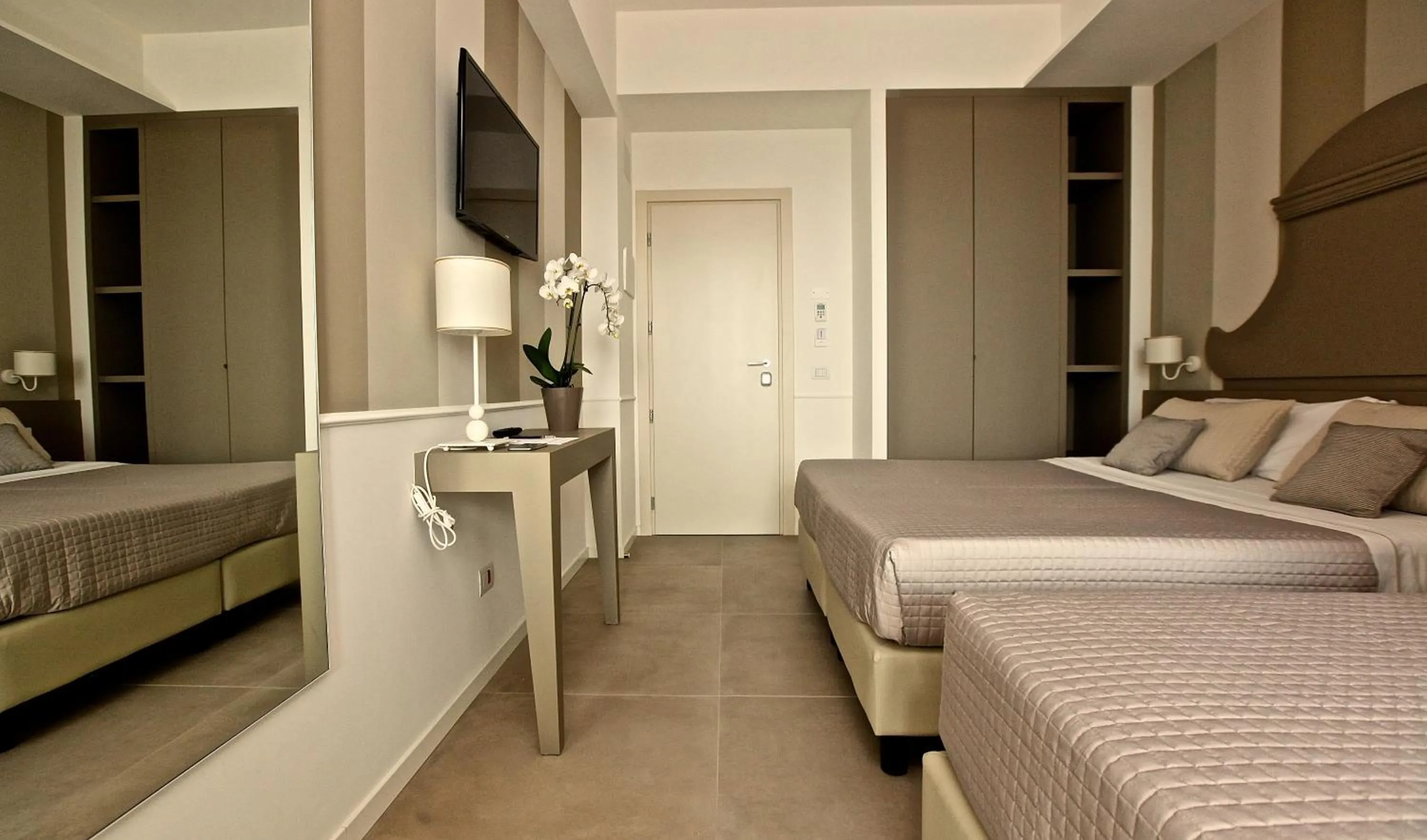 Bed in Hotel Ambassador