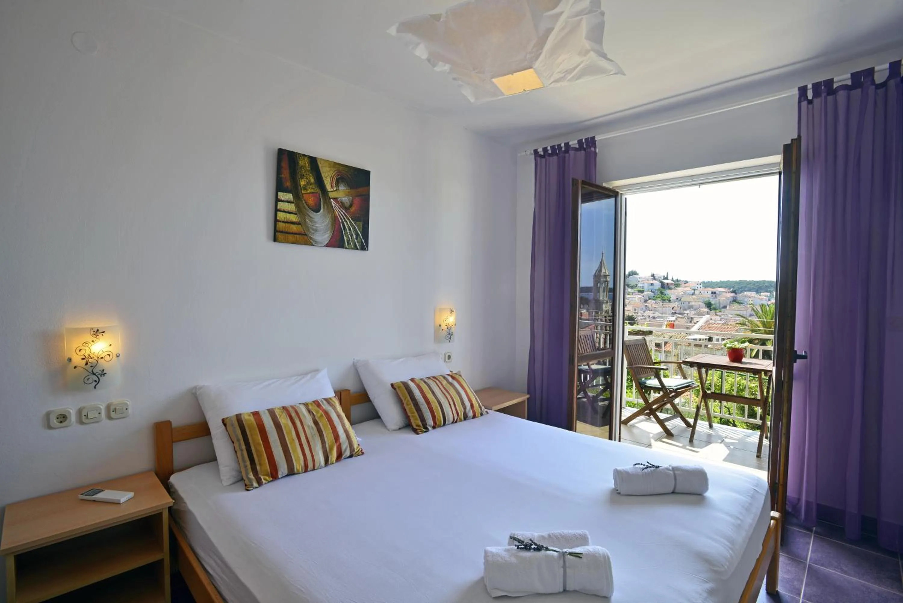 Bedroom, Bed in Apartments and Rooms Bonkan Hvar