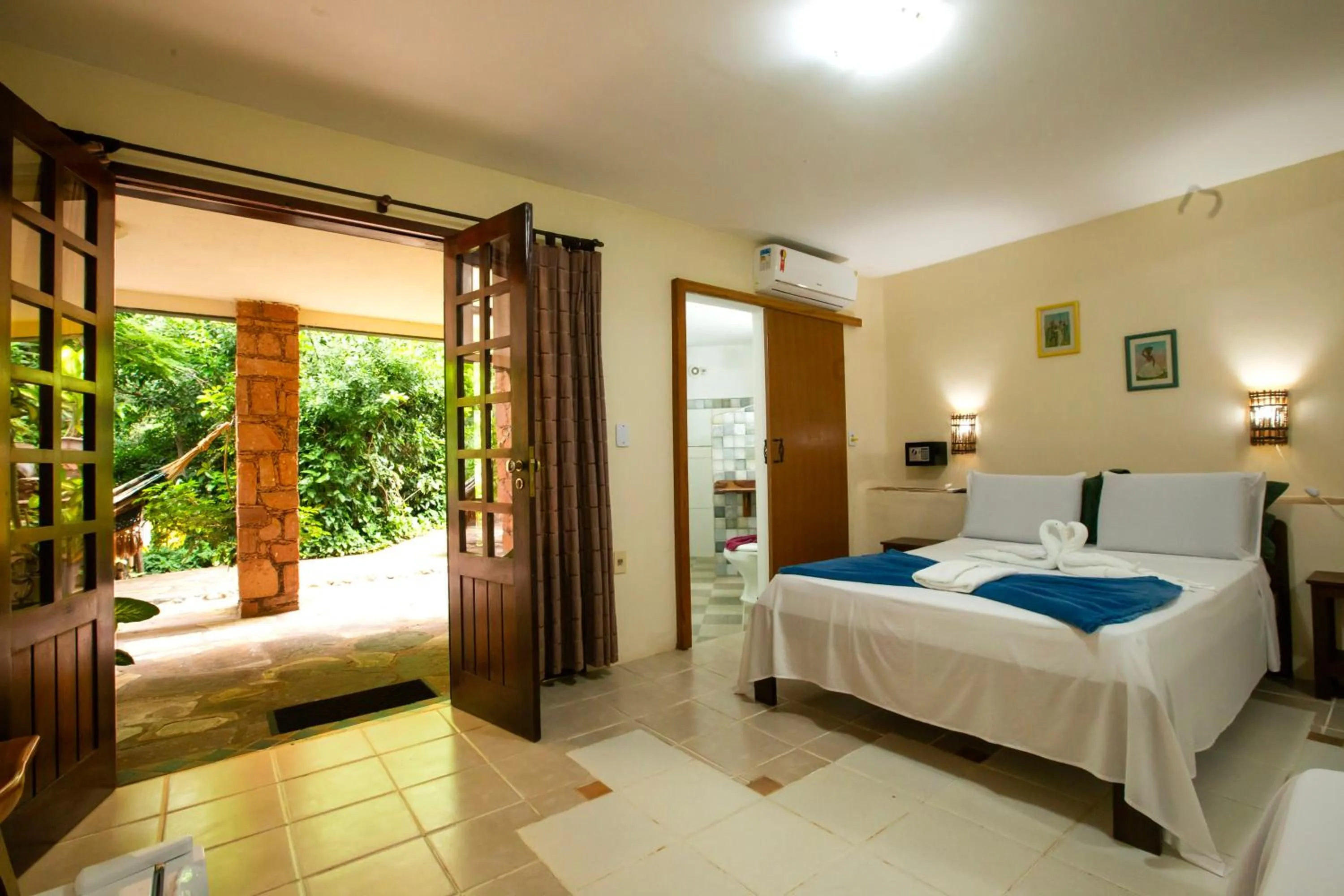 Bed in Pousada Canto No Bosque