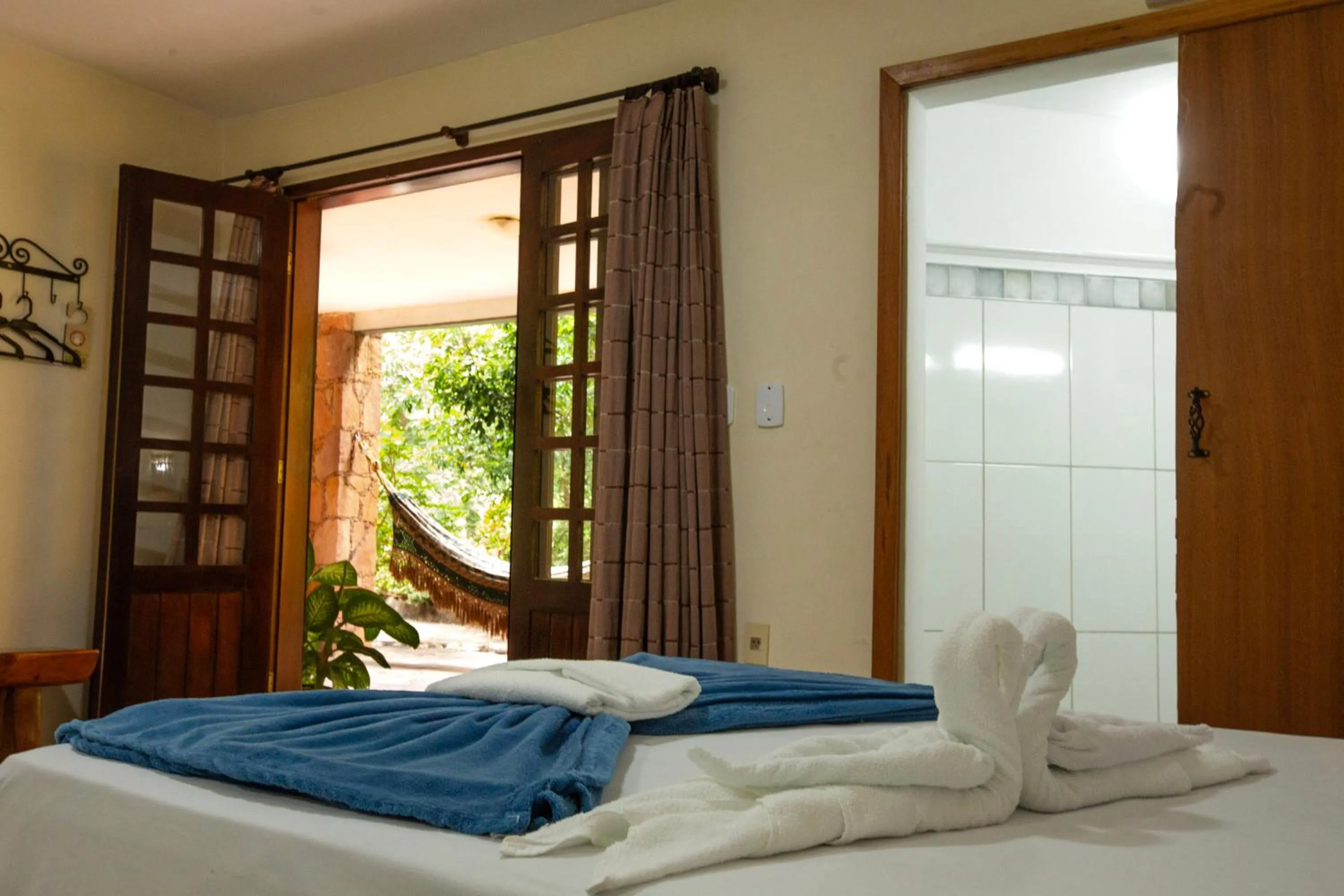 Bed in Pousada Canto No Bosque