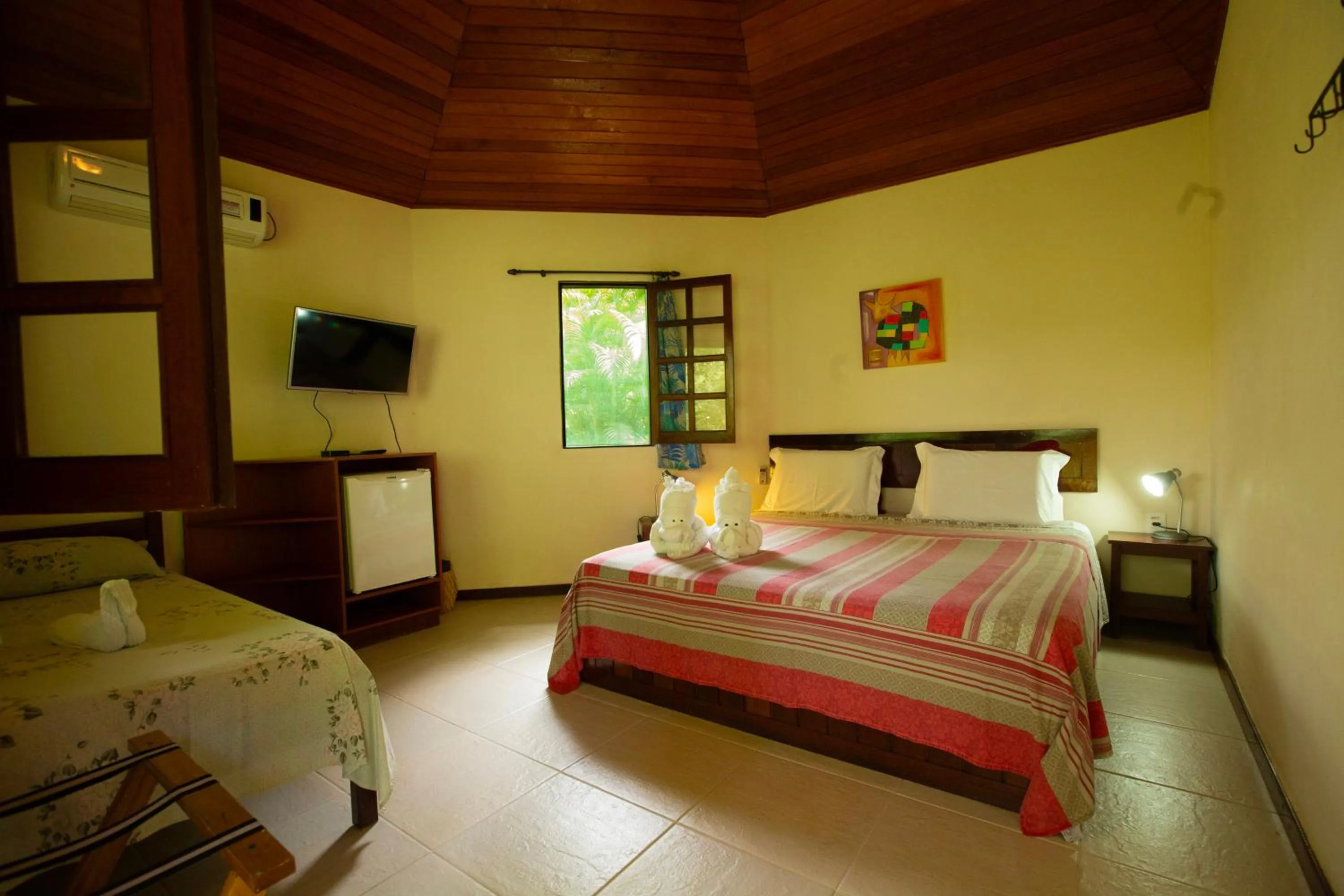 Bed in Pousada Canto No Bosque