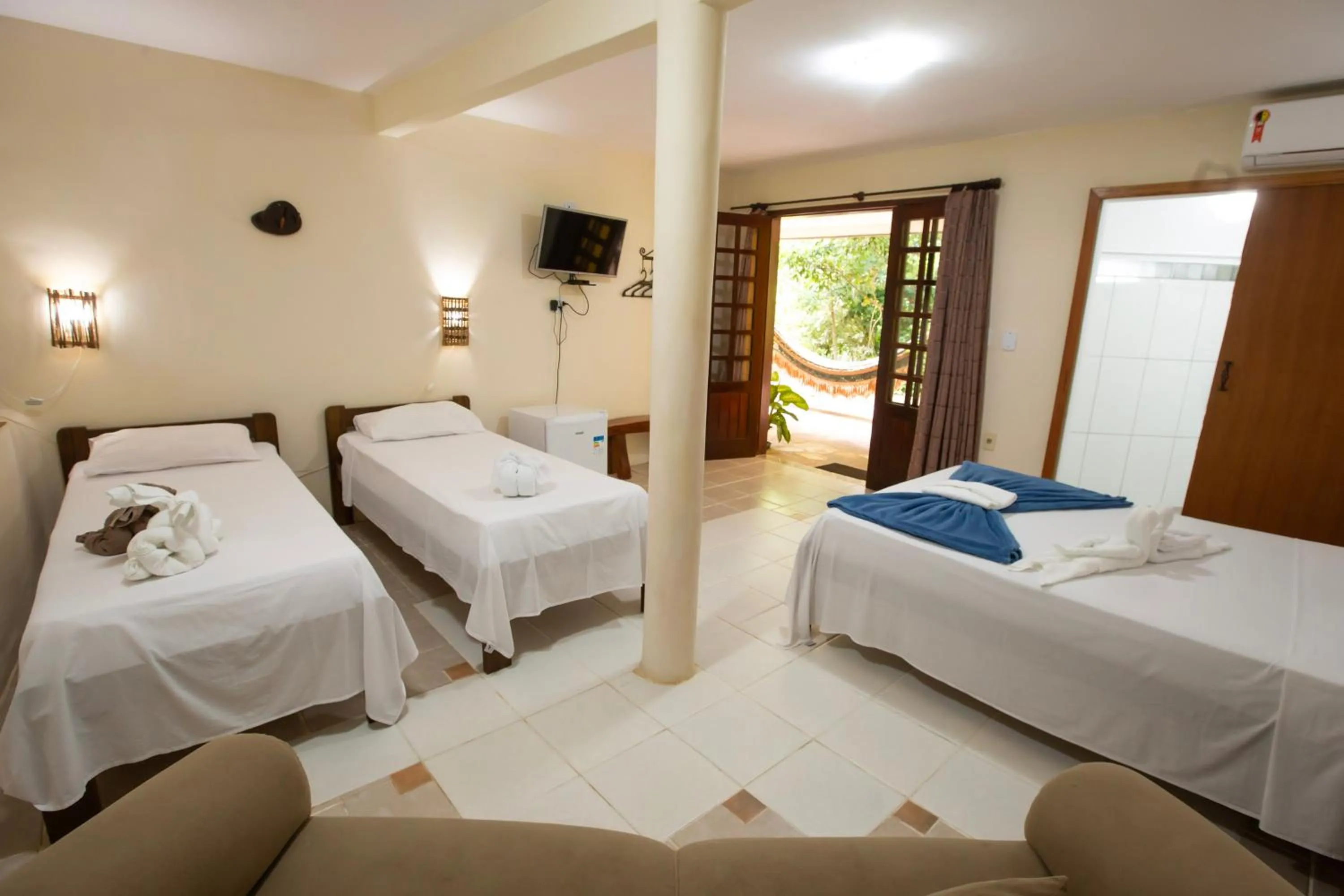 Bed in Pousada Canto No Bosque