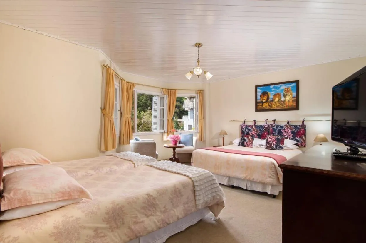 Bed in Pousada Confraria da Terra