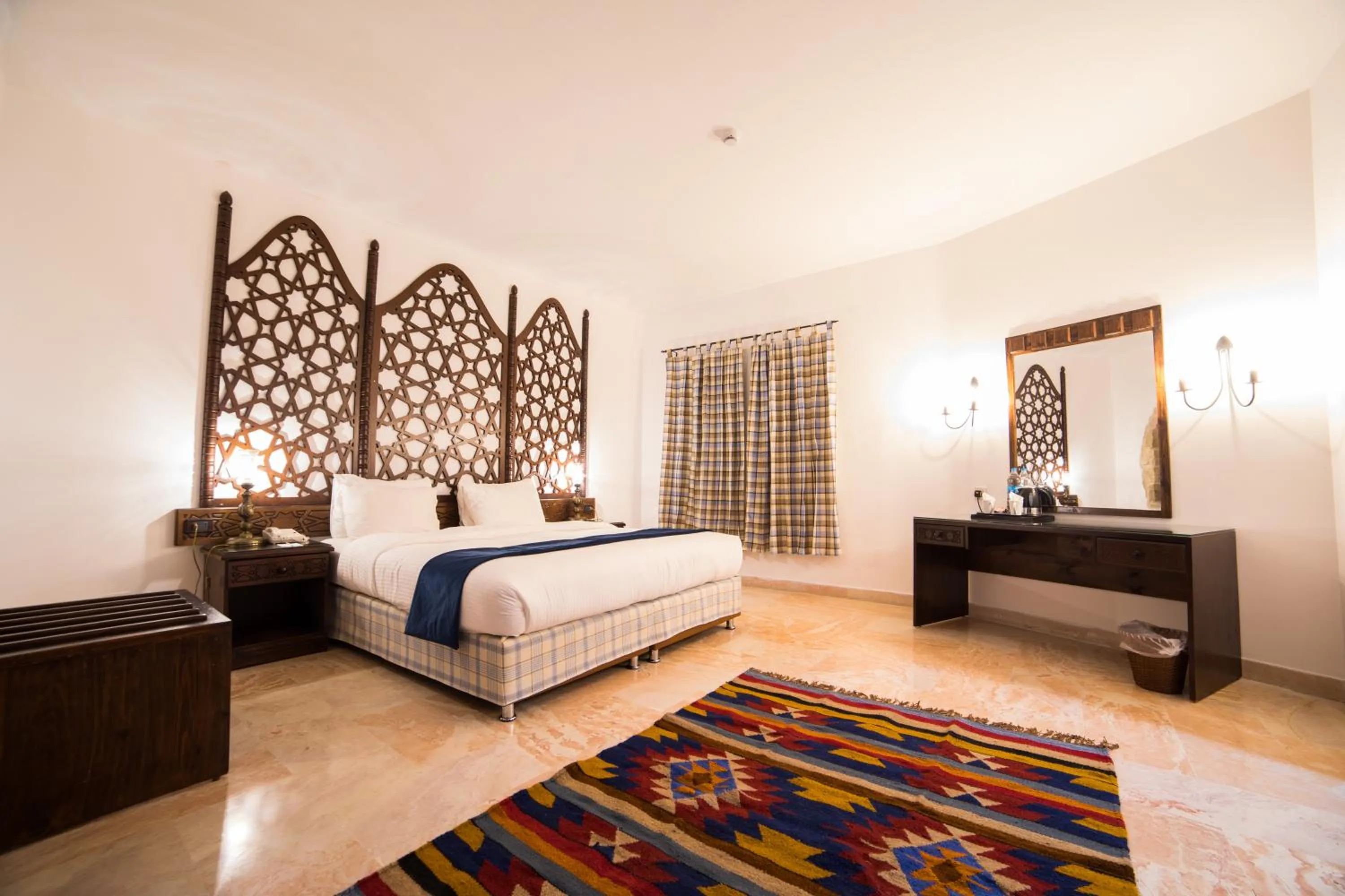 Bed in The Old Village Hotel & Resort