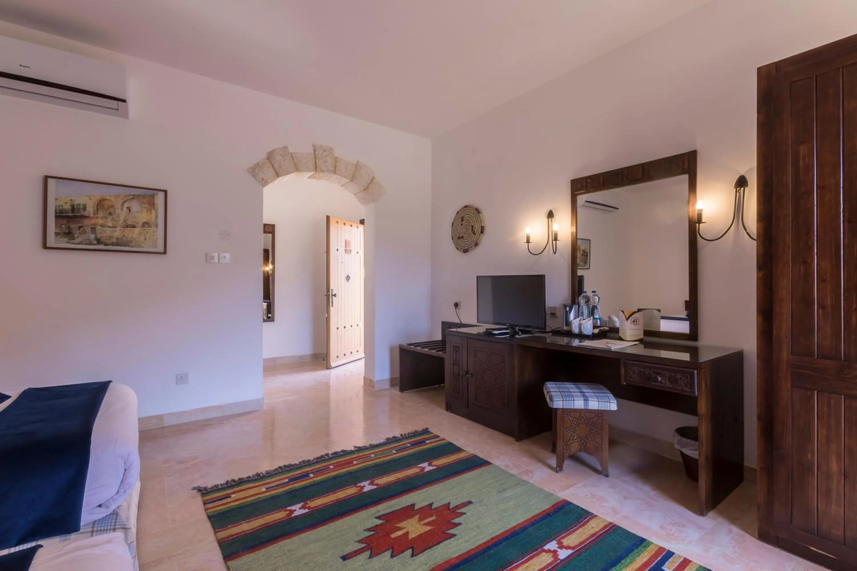 Bed in The Old Village Hotel & Resort