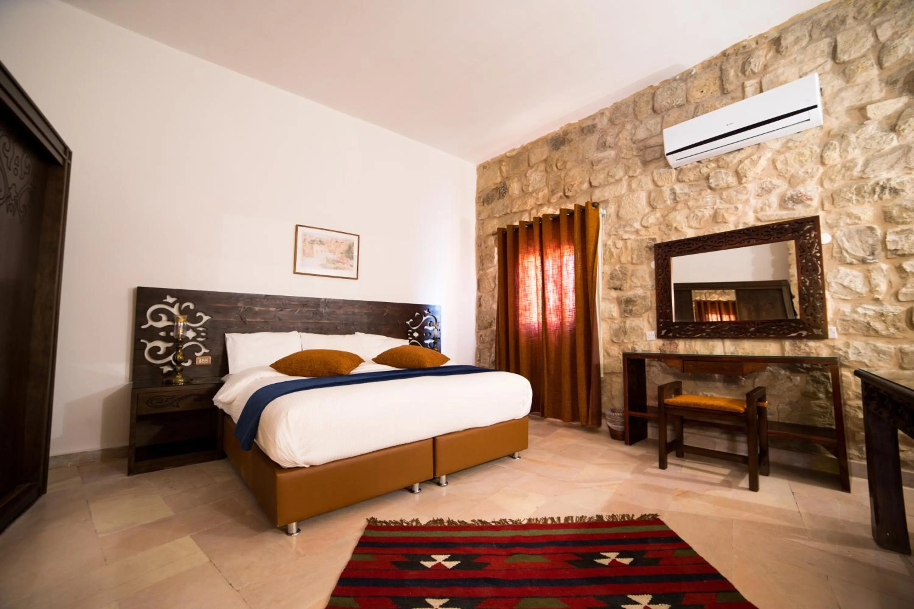 Bed in The Old Village Hotel & Resort