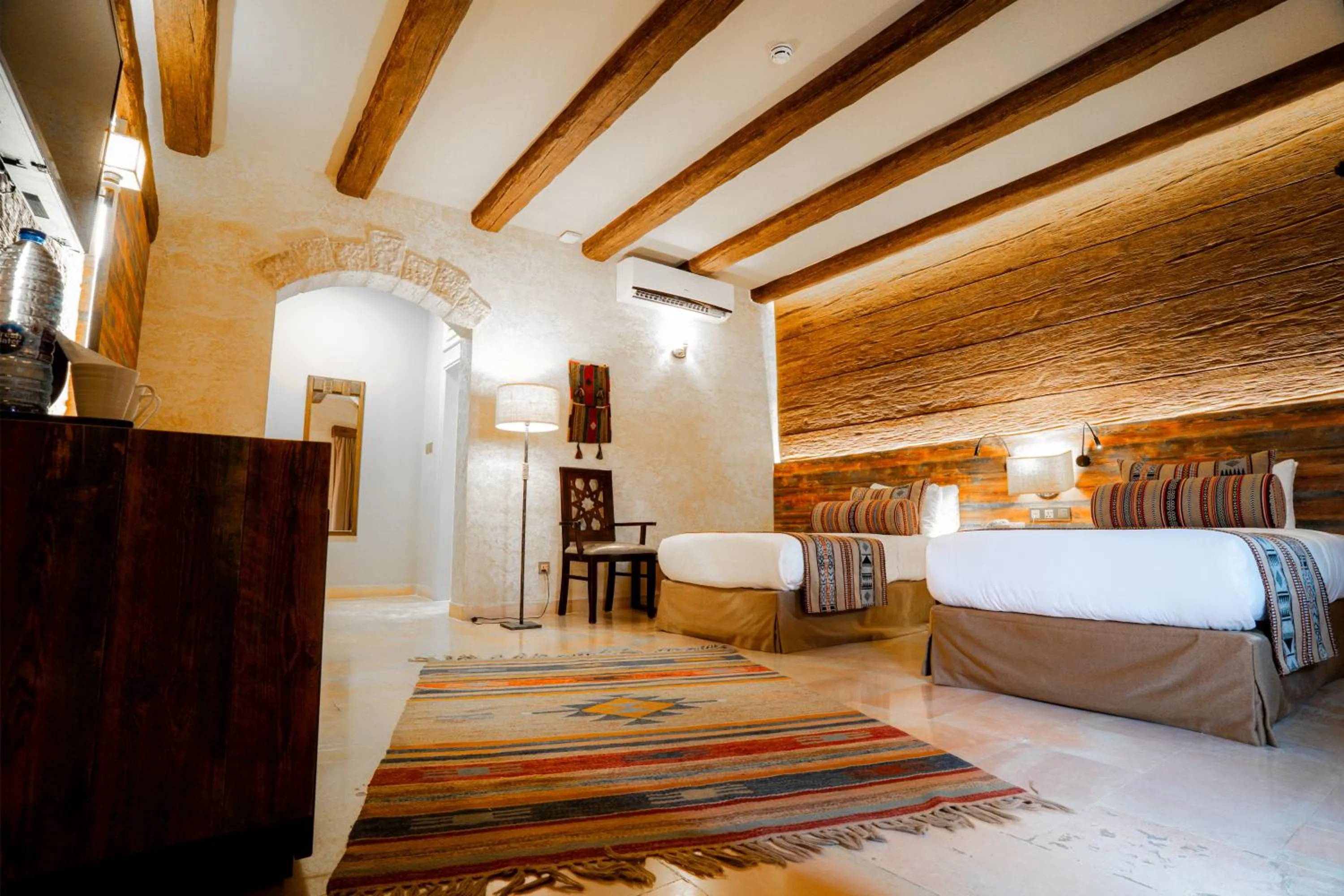 Bed in The Old Village Hotel & Resort