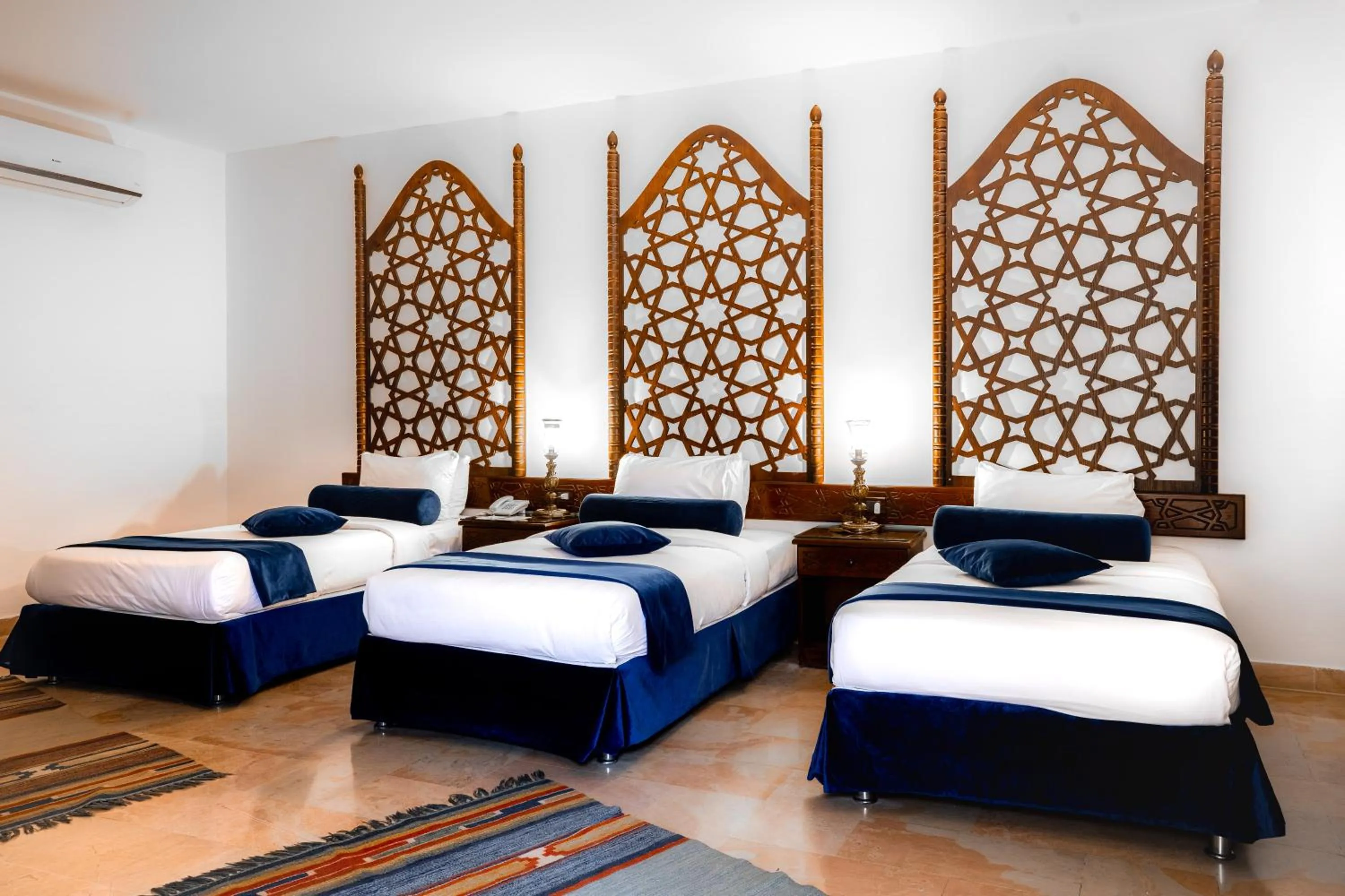 Bed in The Old Village Hotel & Resort