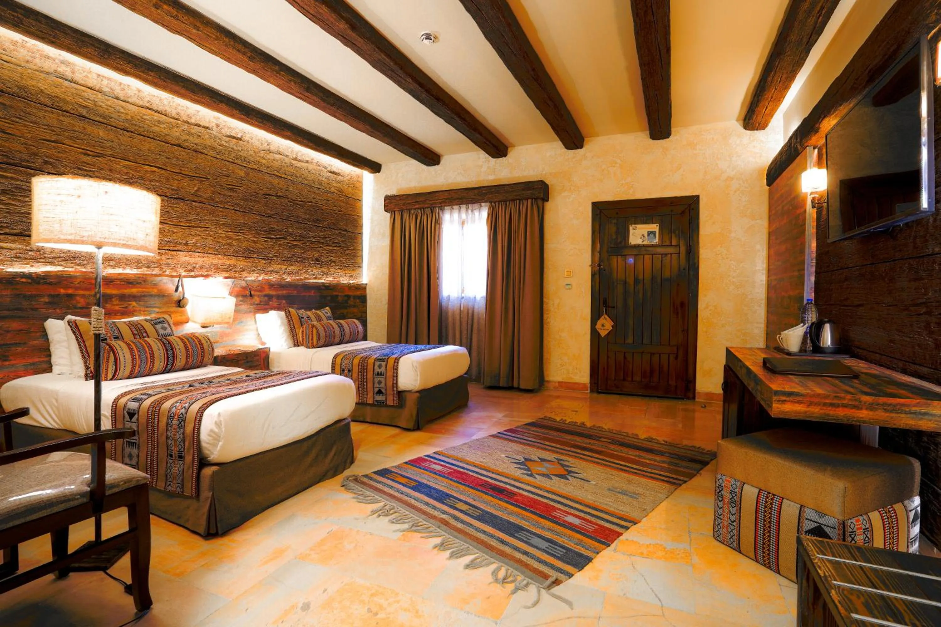 Bed in The Old Village Hotel & Resort