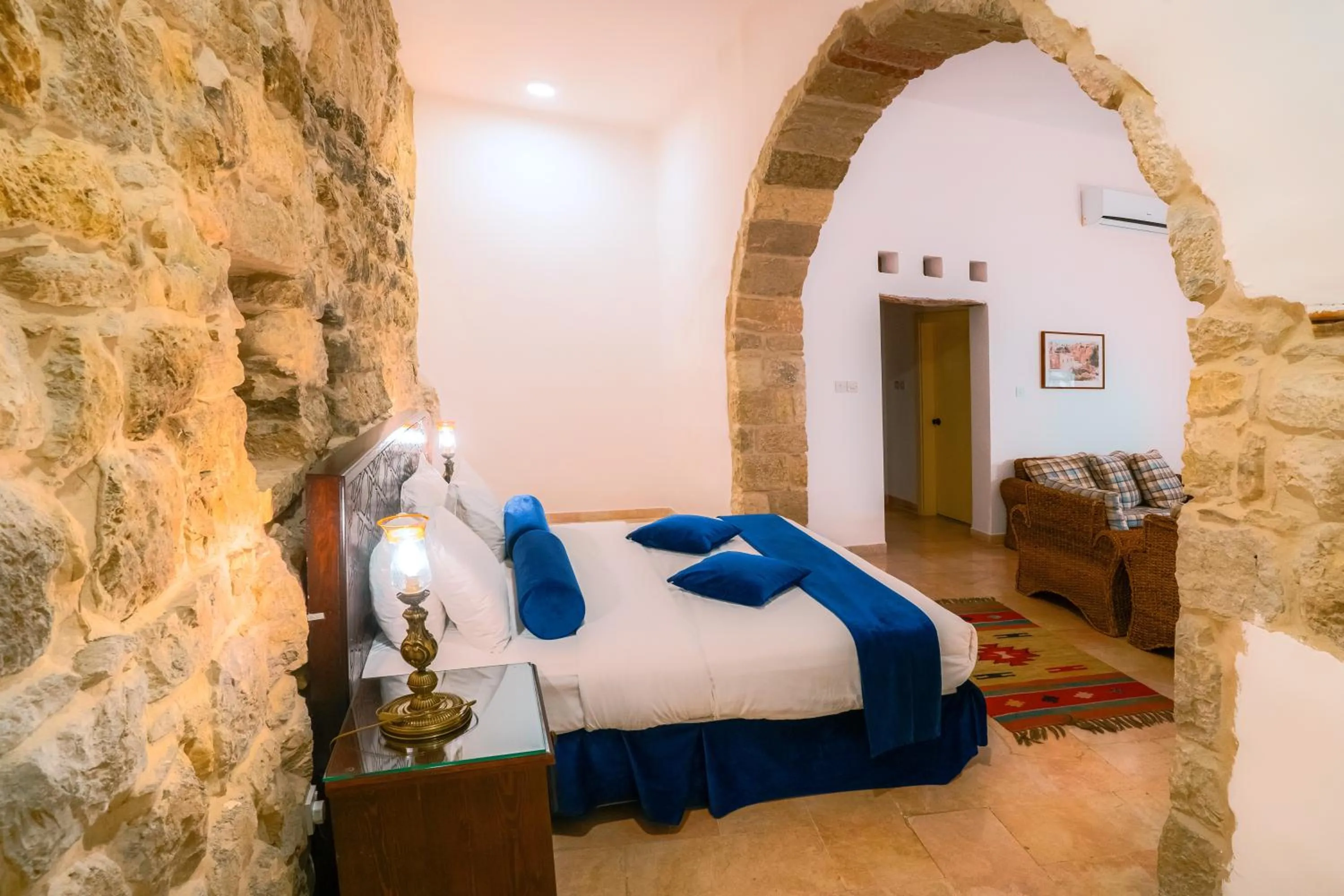 Bed in The Old Village Hotel & Resort