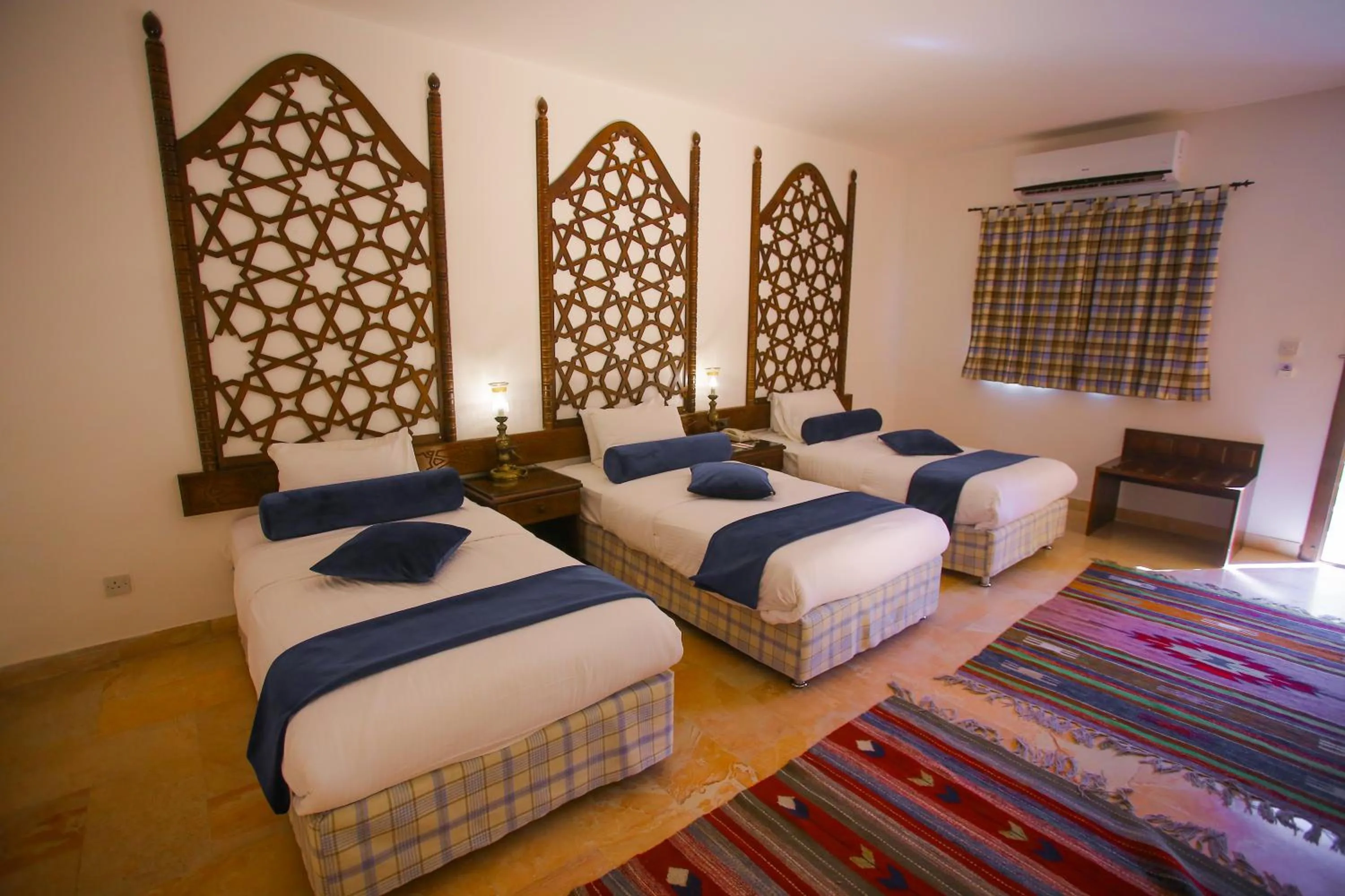 Bed in The Old Village Hotel & Resort