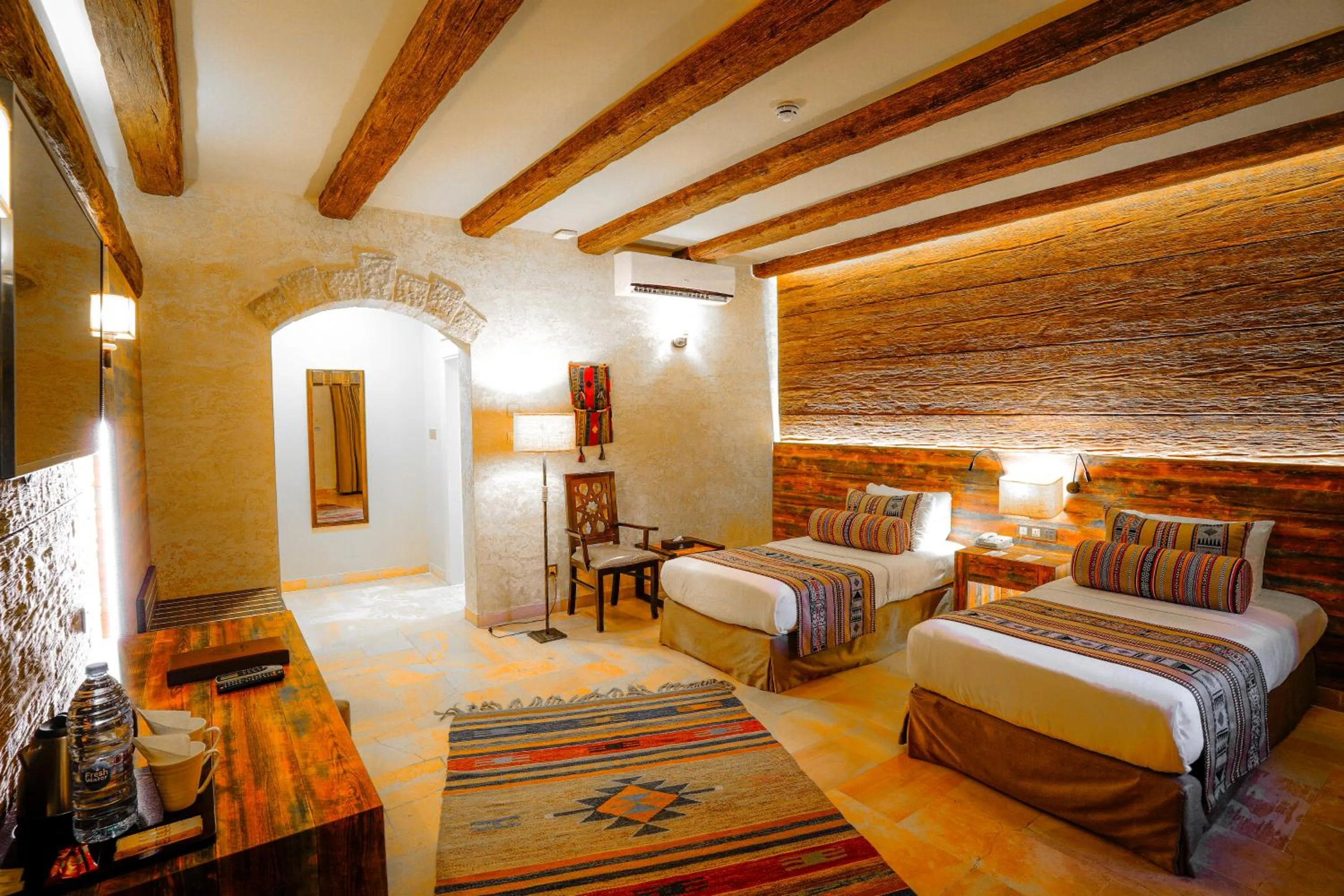 Bed in The Old Village Hotel & Resort