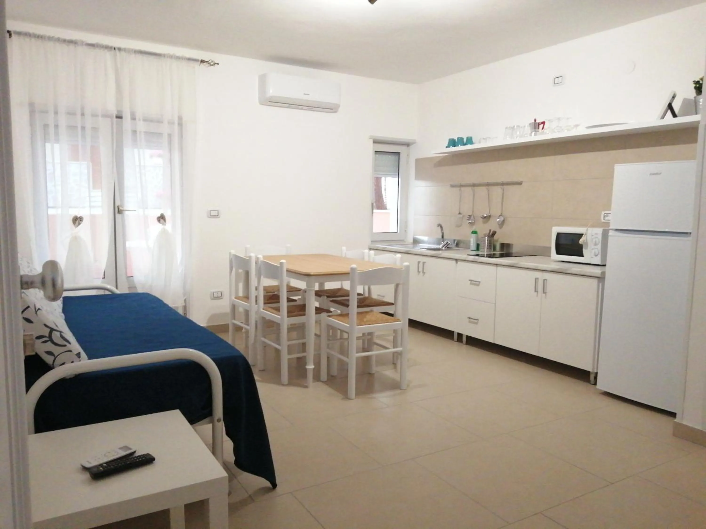 Kitchen or kitchenette in Villa Laura Residence Hotel Apartments & Studios