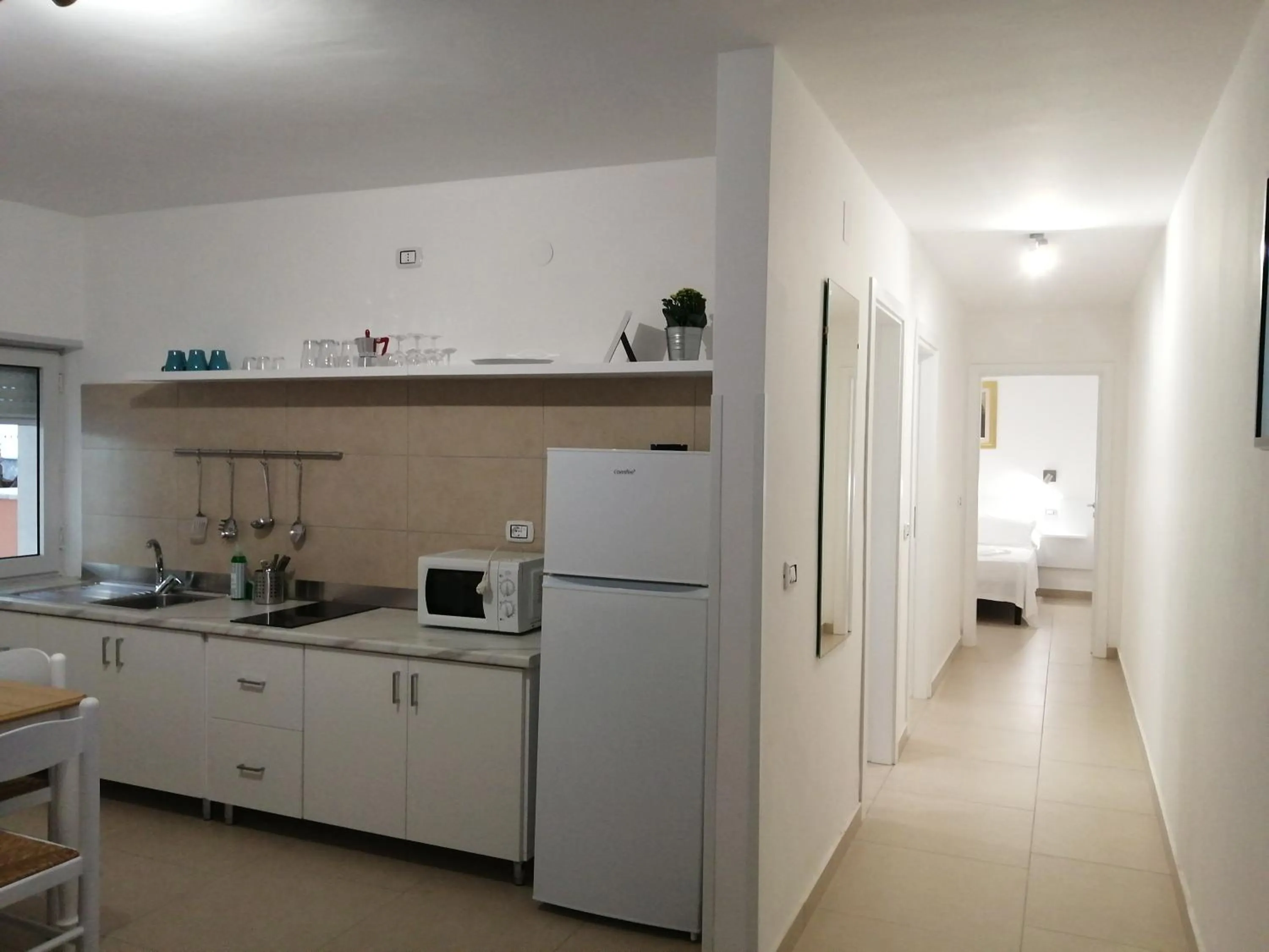 Kitchen or kitchenette in Villa Laura Residence Hotel Apartments & Studios