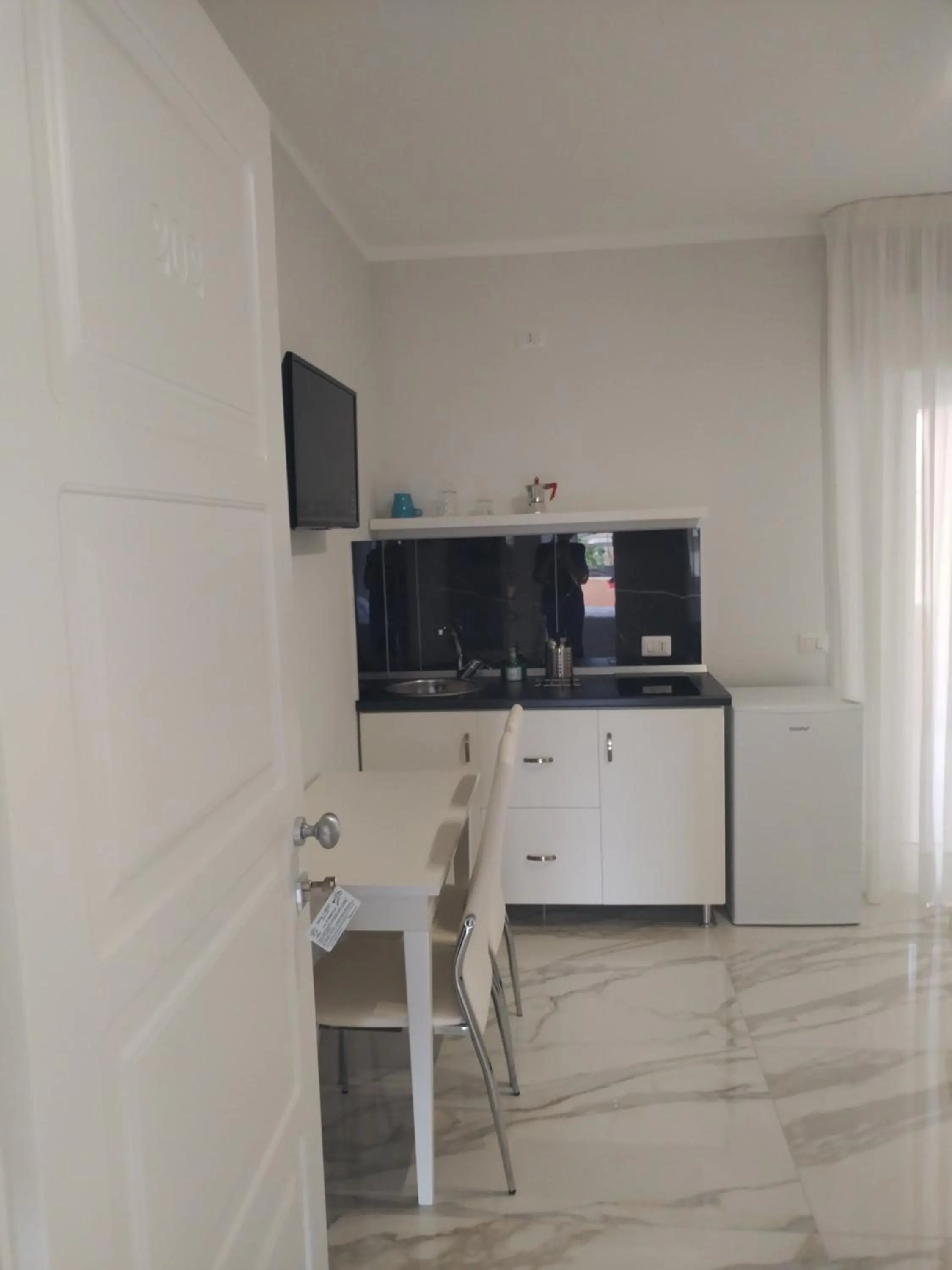 Photo of the whole room in Villa Laura Residence Hotel Apartments & Studios