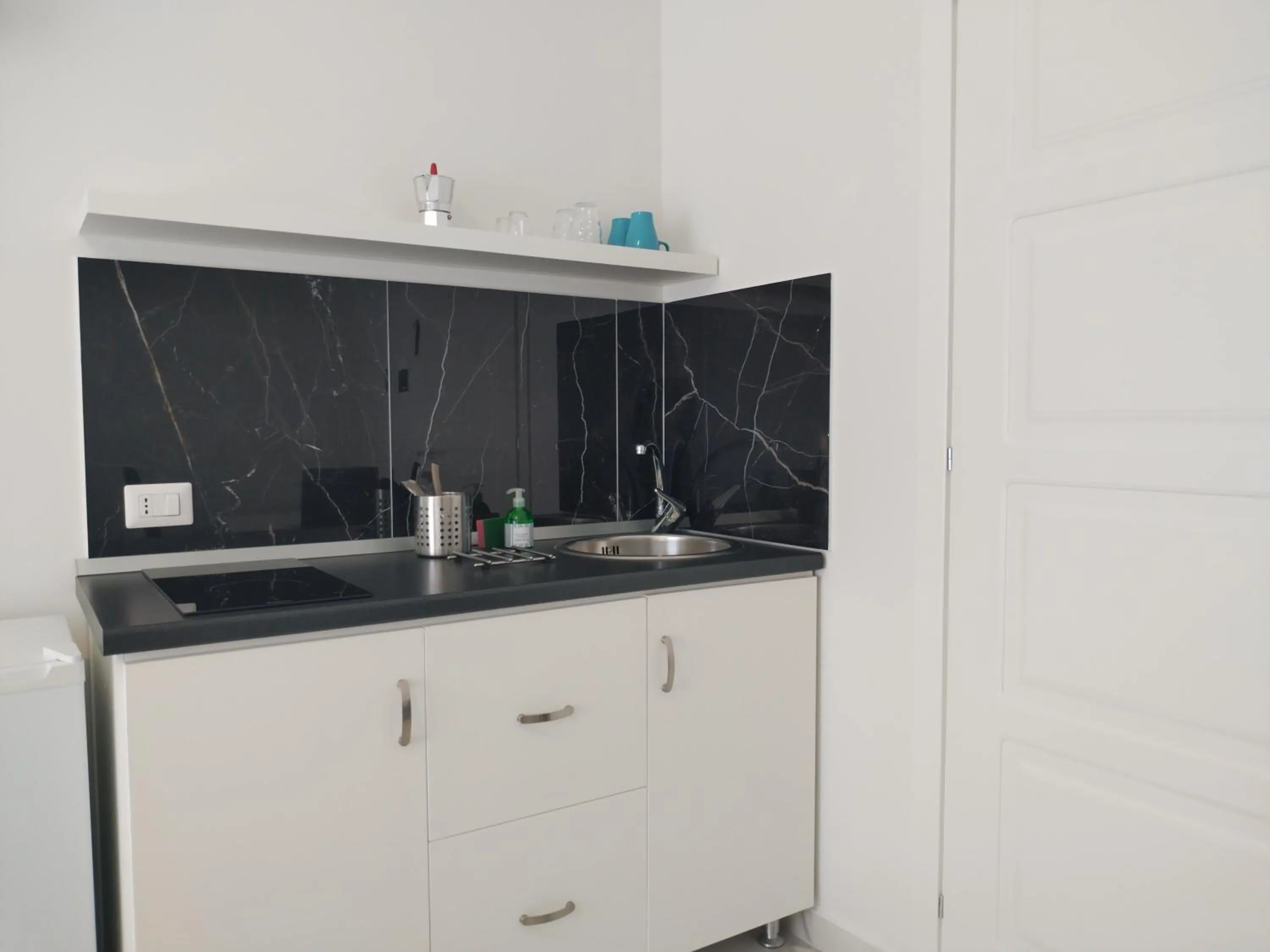 Kitchen or kitchenette in Villa Laura Residence Hotel Apartments & Studios