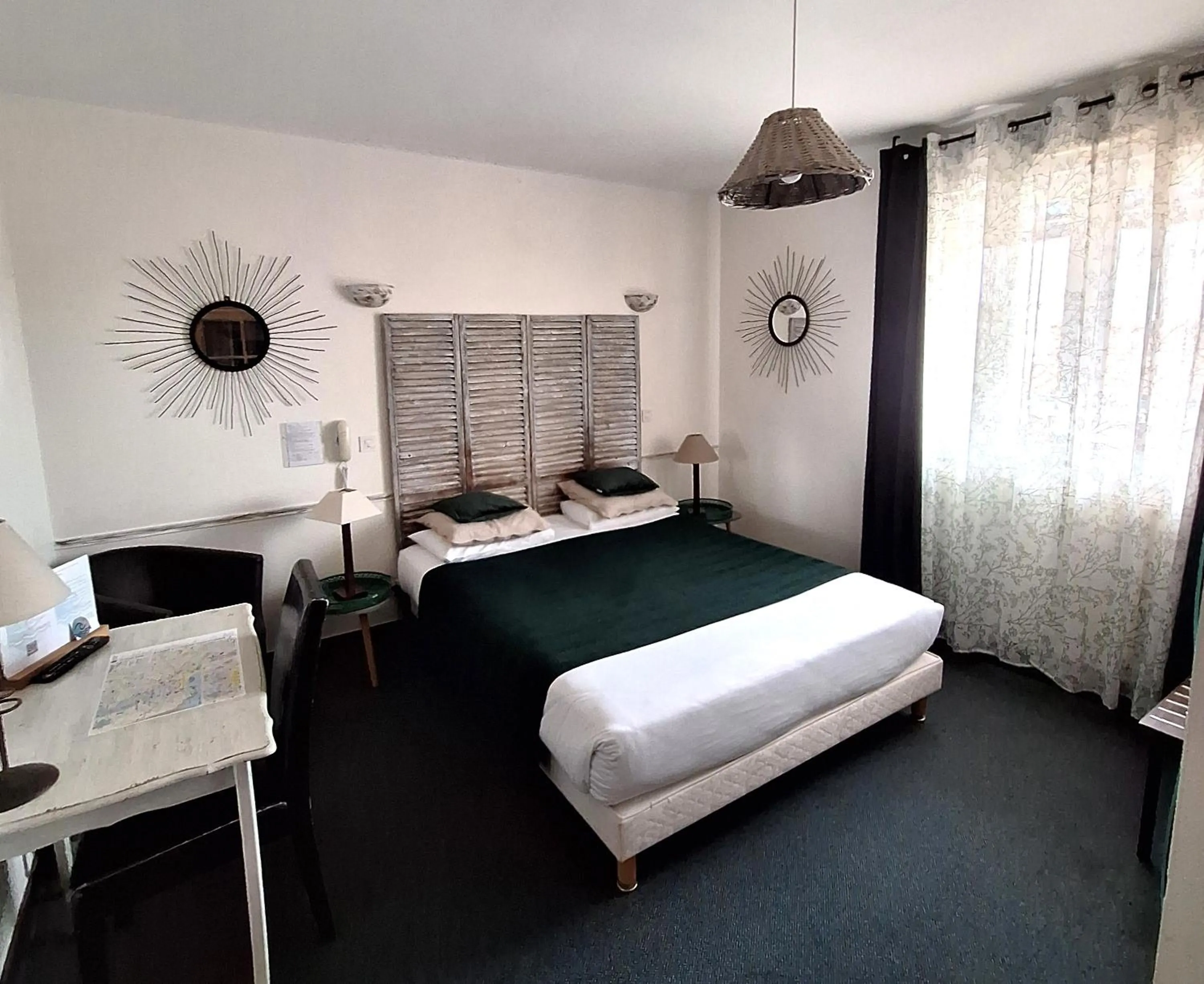 Photo of the whole room, Bed in Hôtel Les Embruns Sables d'Olonne