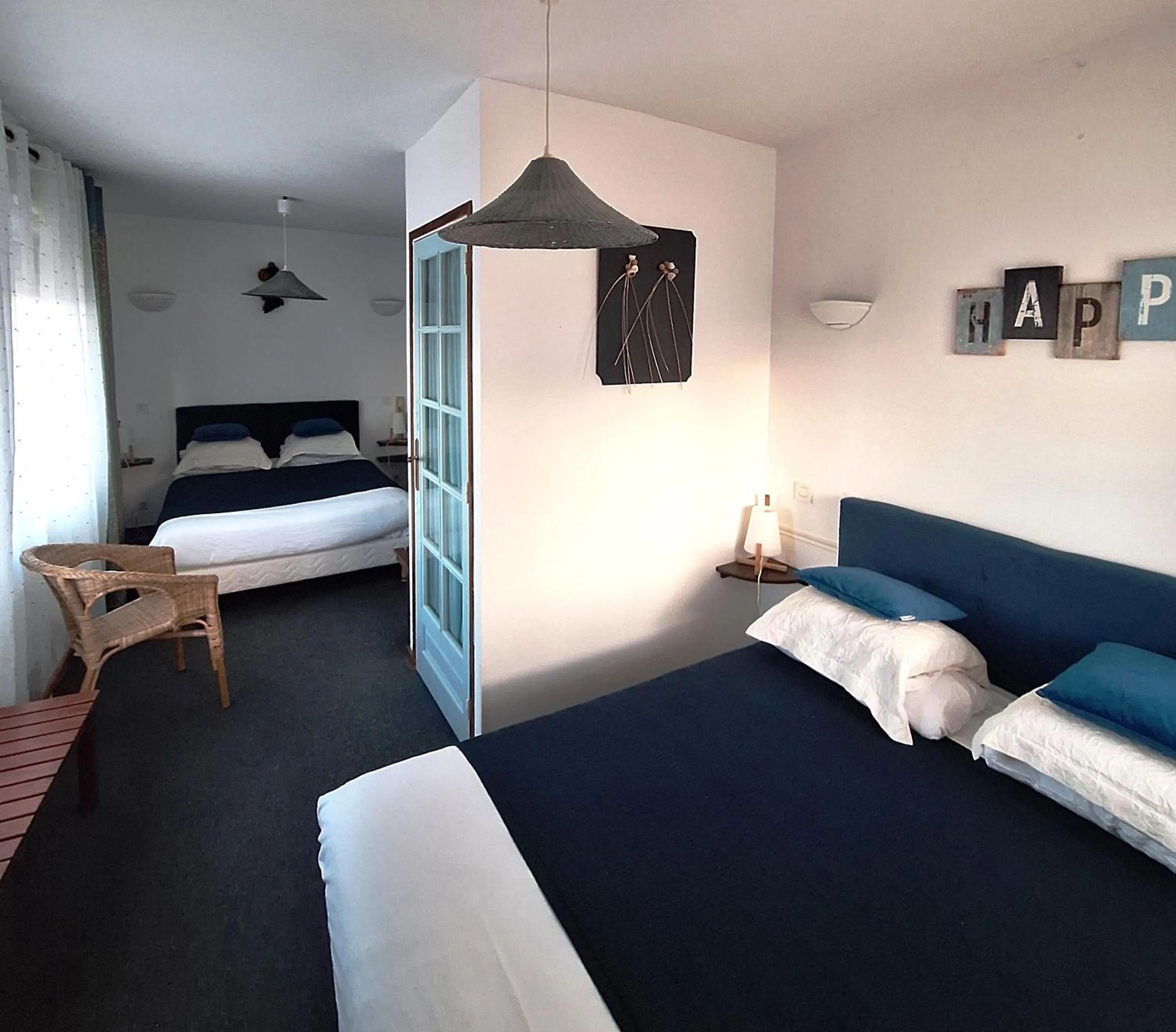 Photo of the whole room, Bed in Hôtel Les Embruns Sables d'Olonne