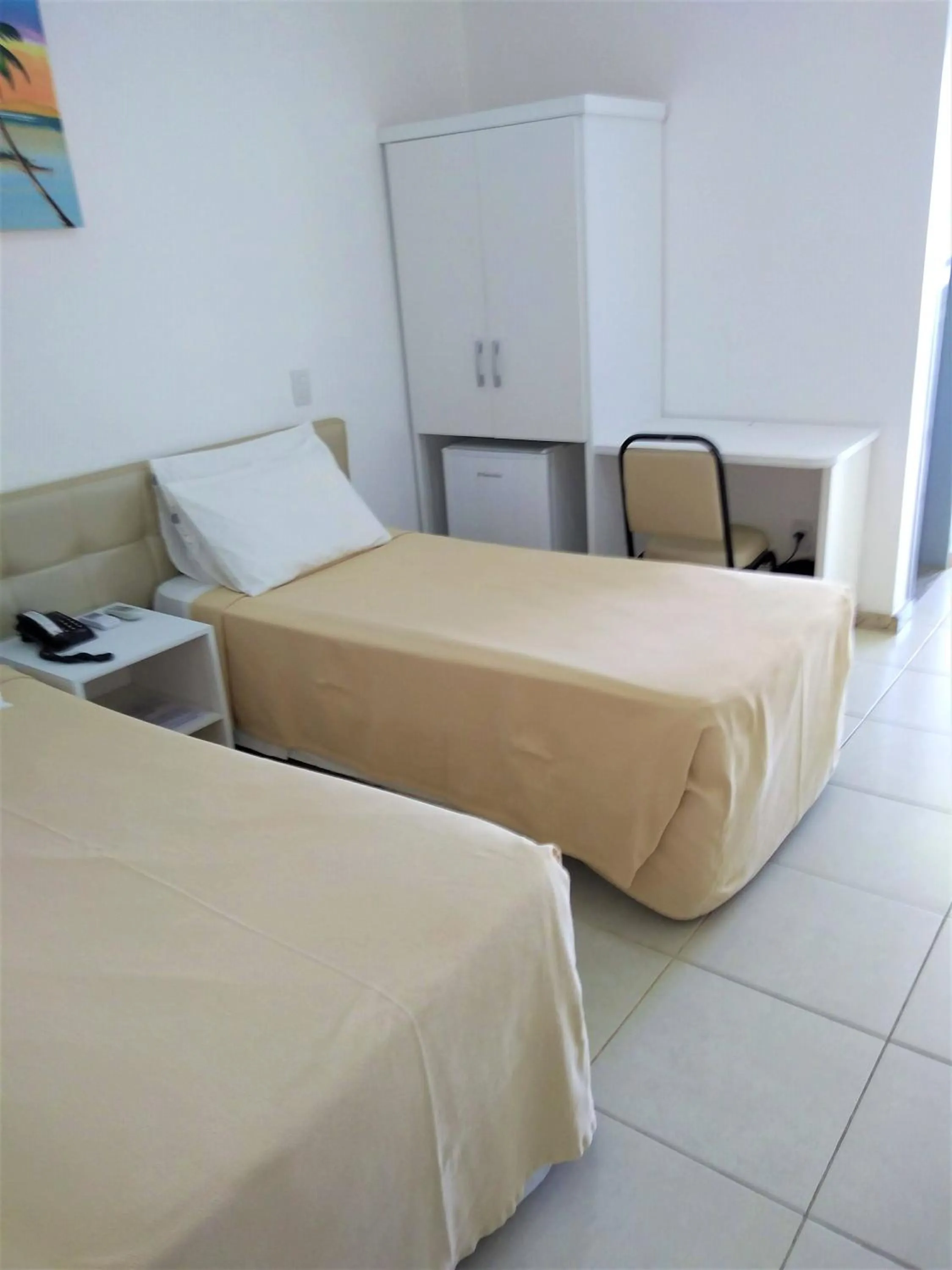 Photo of the whole room, Bed in Simas Praia Hotel