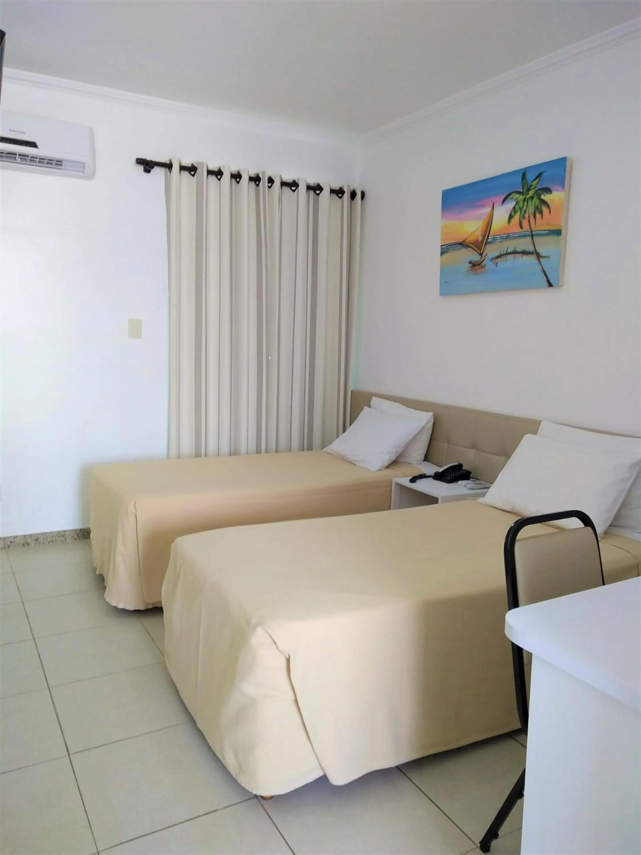 Photo of the whole room, Bed in Simas Praia Hotel