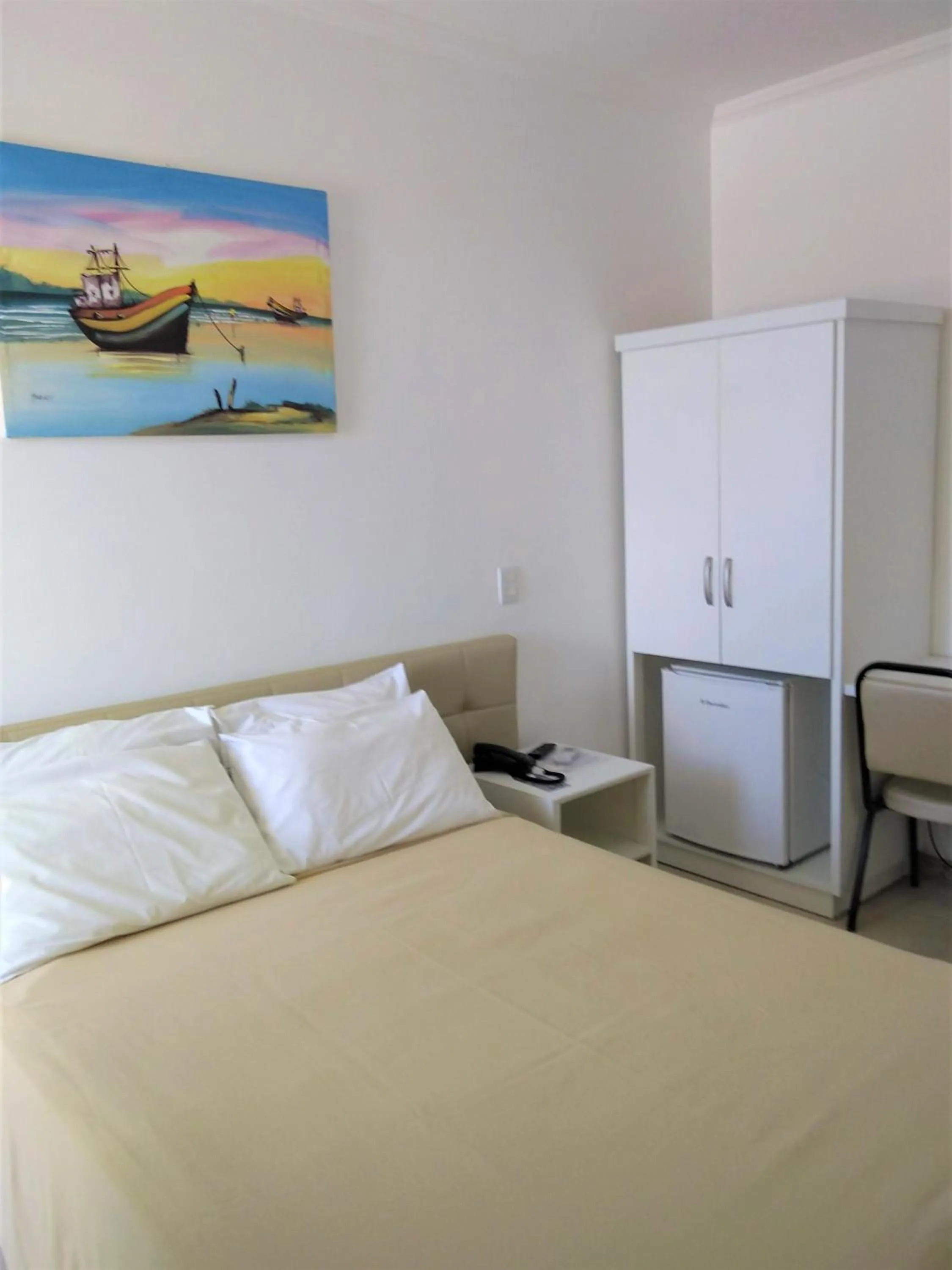 Photo of the whole room, Bed in Simas Praia Hotel